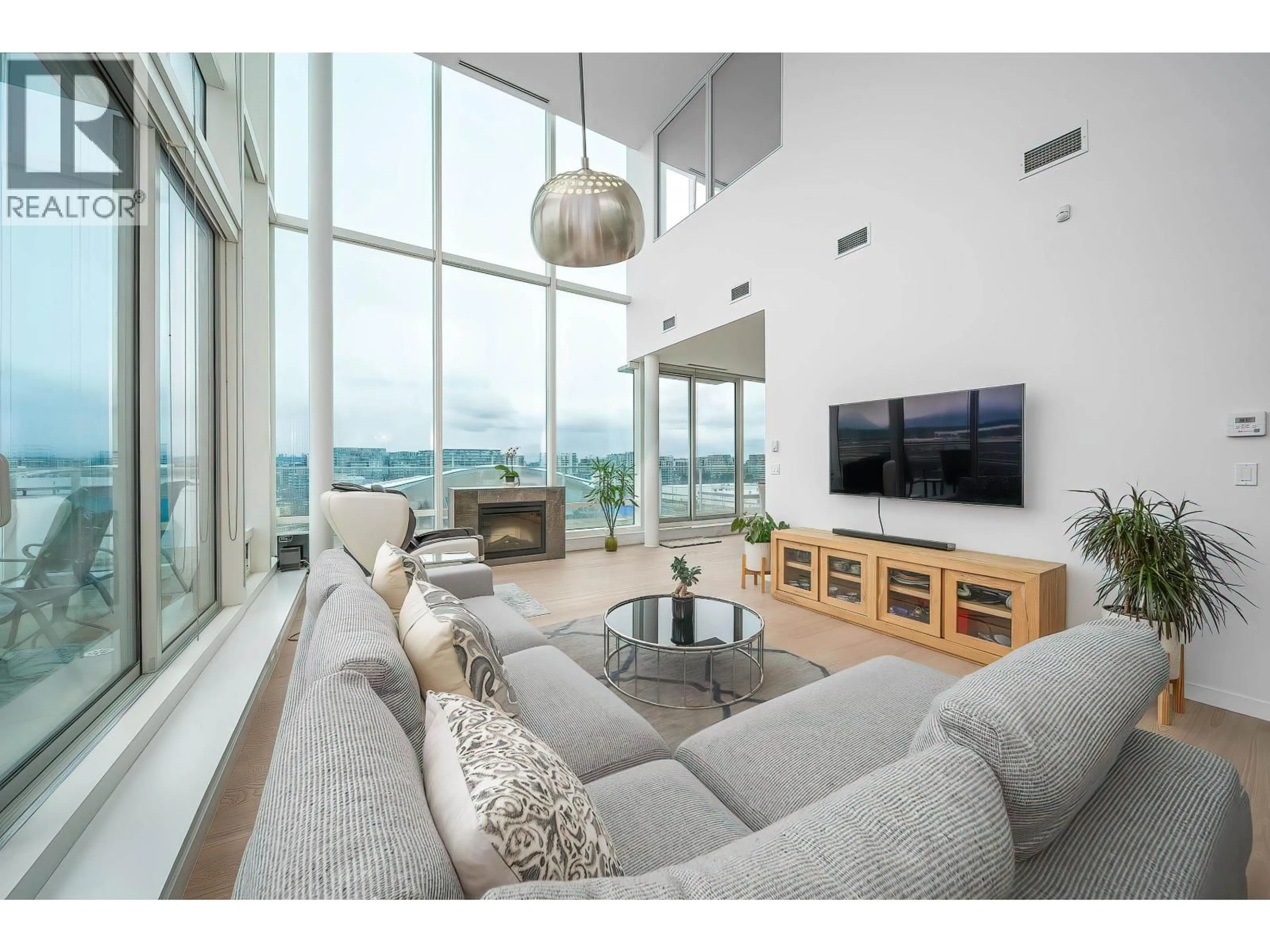 Living room with furniture, unknown for 901 - 5131 BRIGHOUSE WAY, Richmond British Columbia V7C0A6