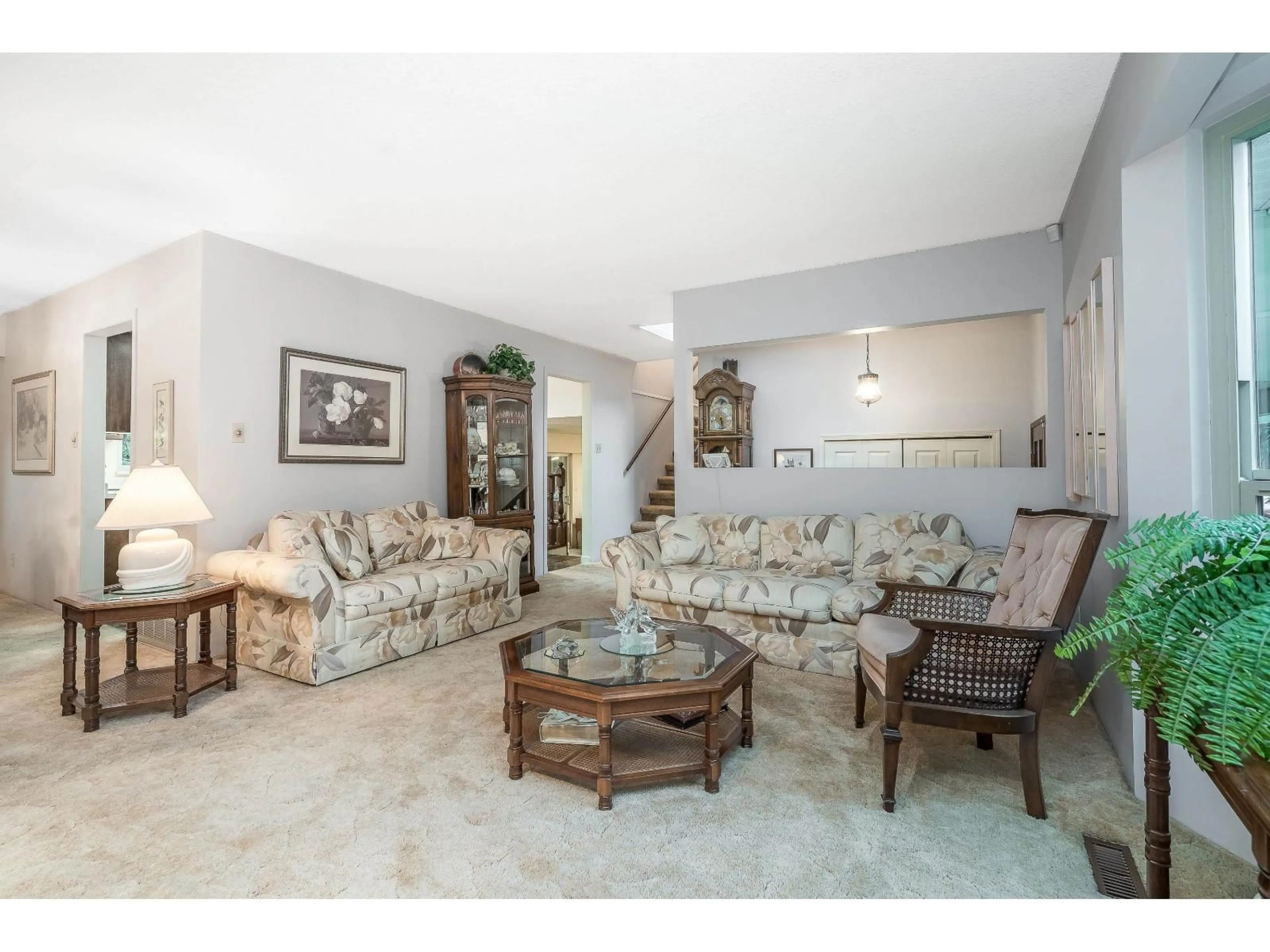 Living room with furniture, ceramic/tile floor for 21073 43 AVENUE, Langley British Columbia V3A7M9