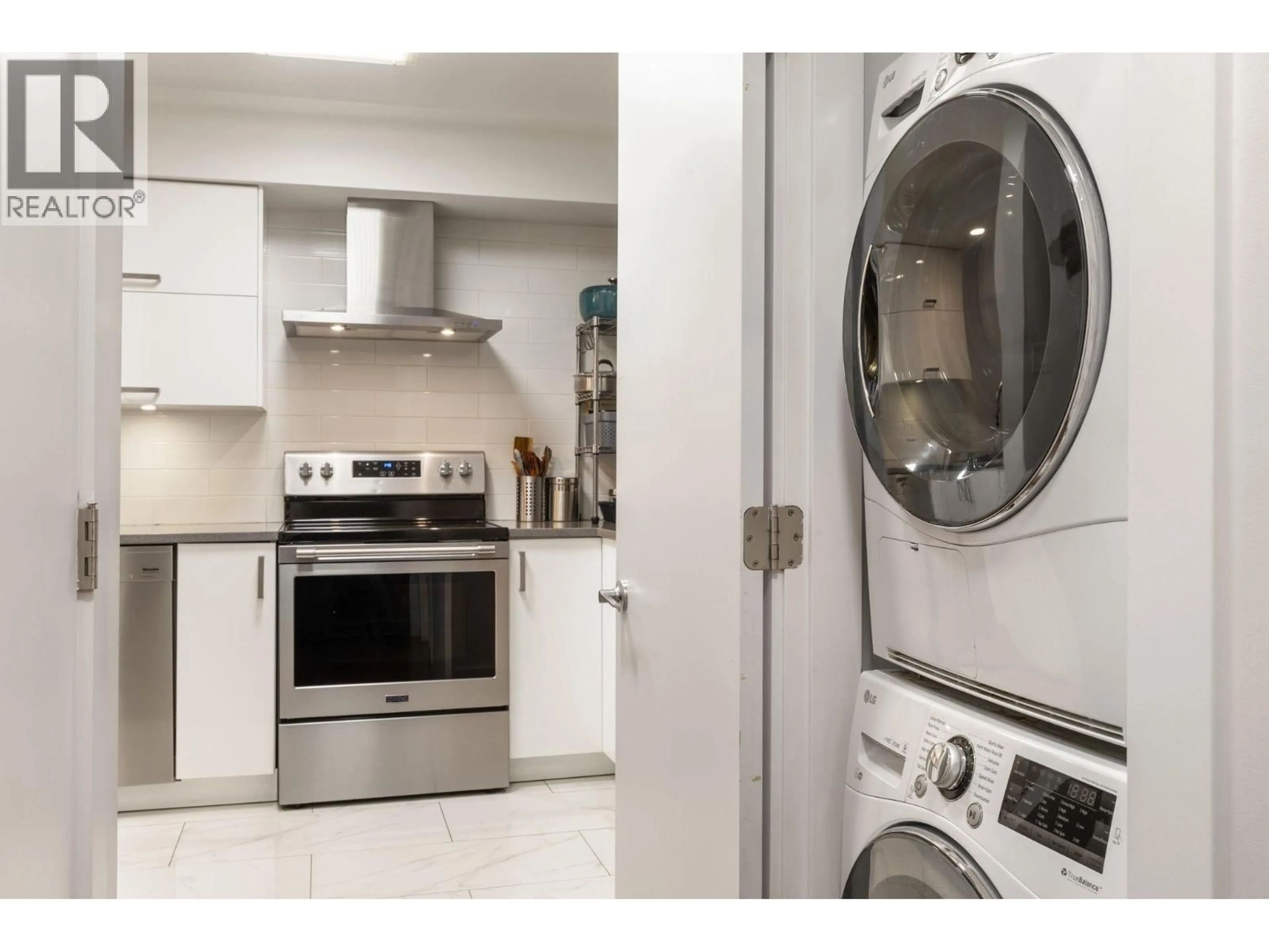 Kitchen with laundary machines, unknown for 201 - 1225 BARCLAY STREET, Vancouver British Columbia V6E1H5