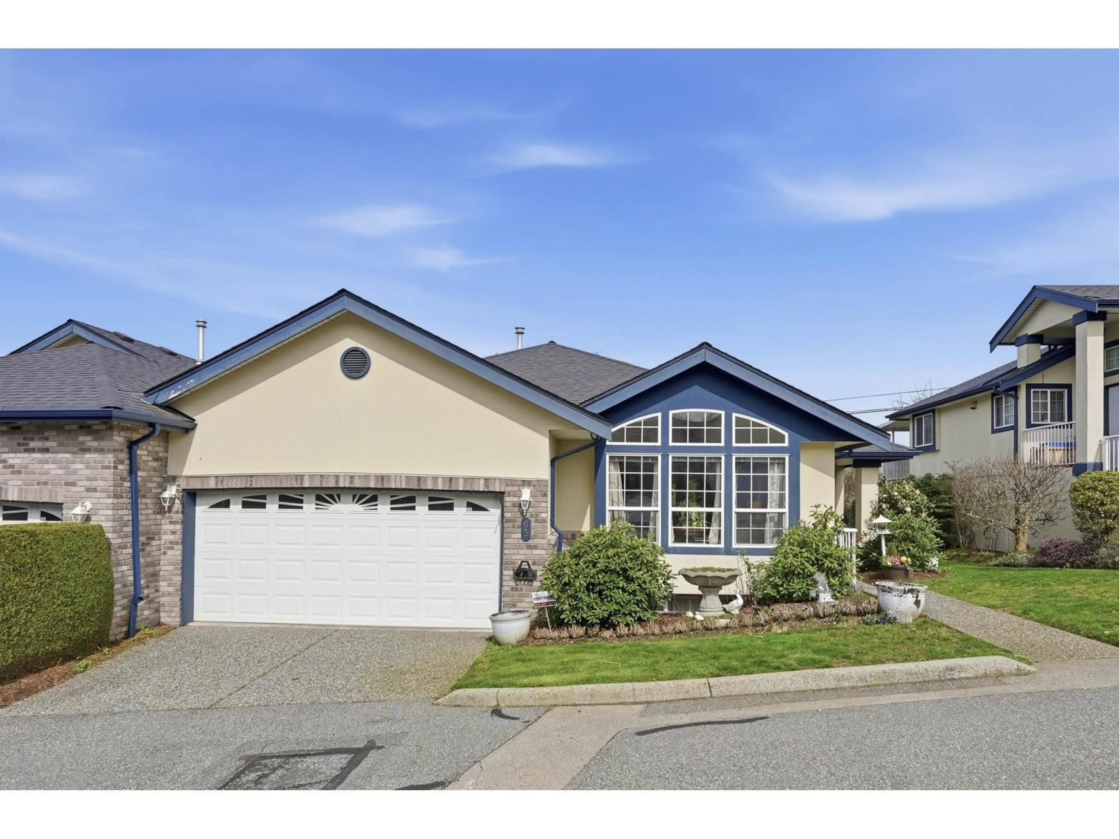 Home with vinyl exterior material, street for 65 - 32777 CHILCOTIN DRIVE, Abbotsford British Columbia V2T5W4