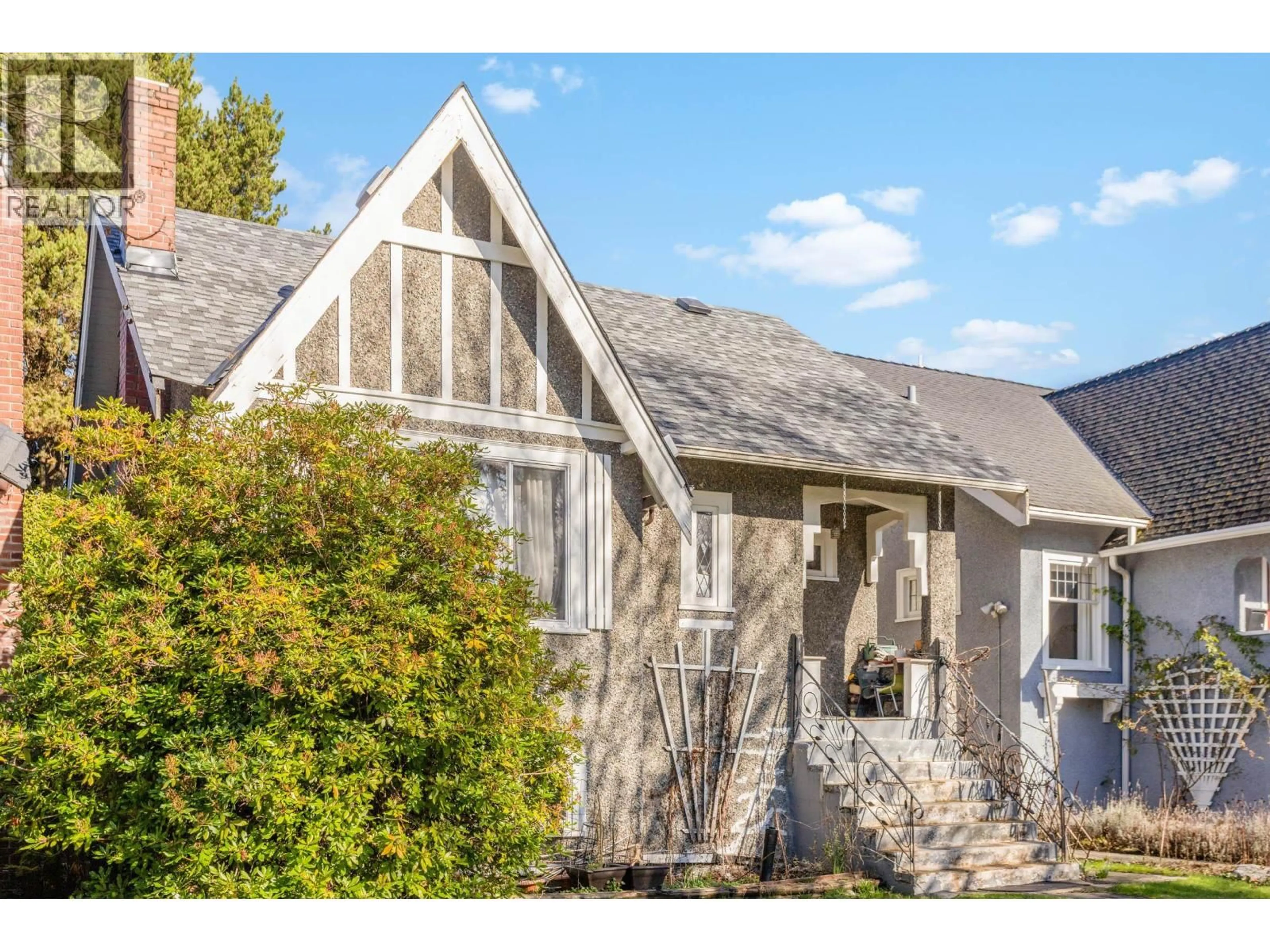 Home with brick exterior material, street for 2861 15TH AVENUE, Vancouver British Columbia V6K3A1