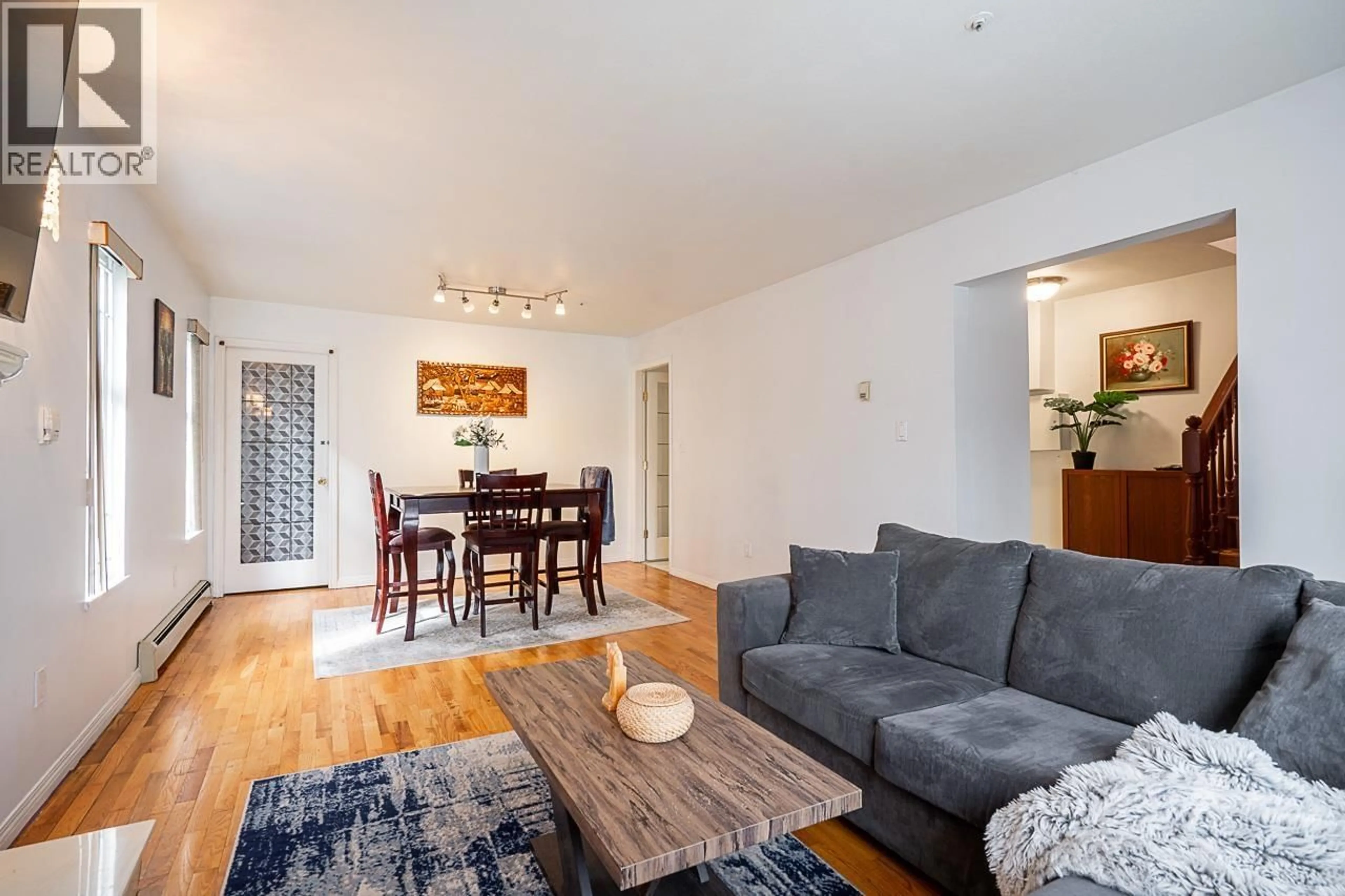 Living room with furniture, wood/laminate floor for 1407 12TH AVENUE, Vancouver British Columbia V5N2A1