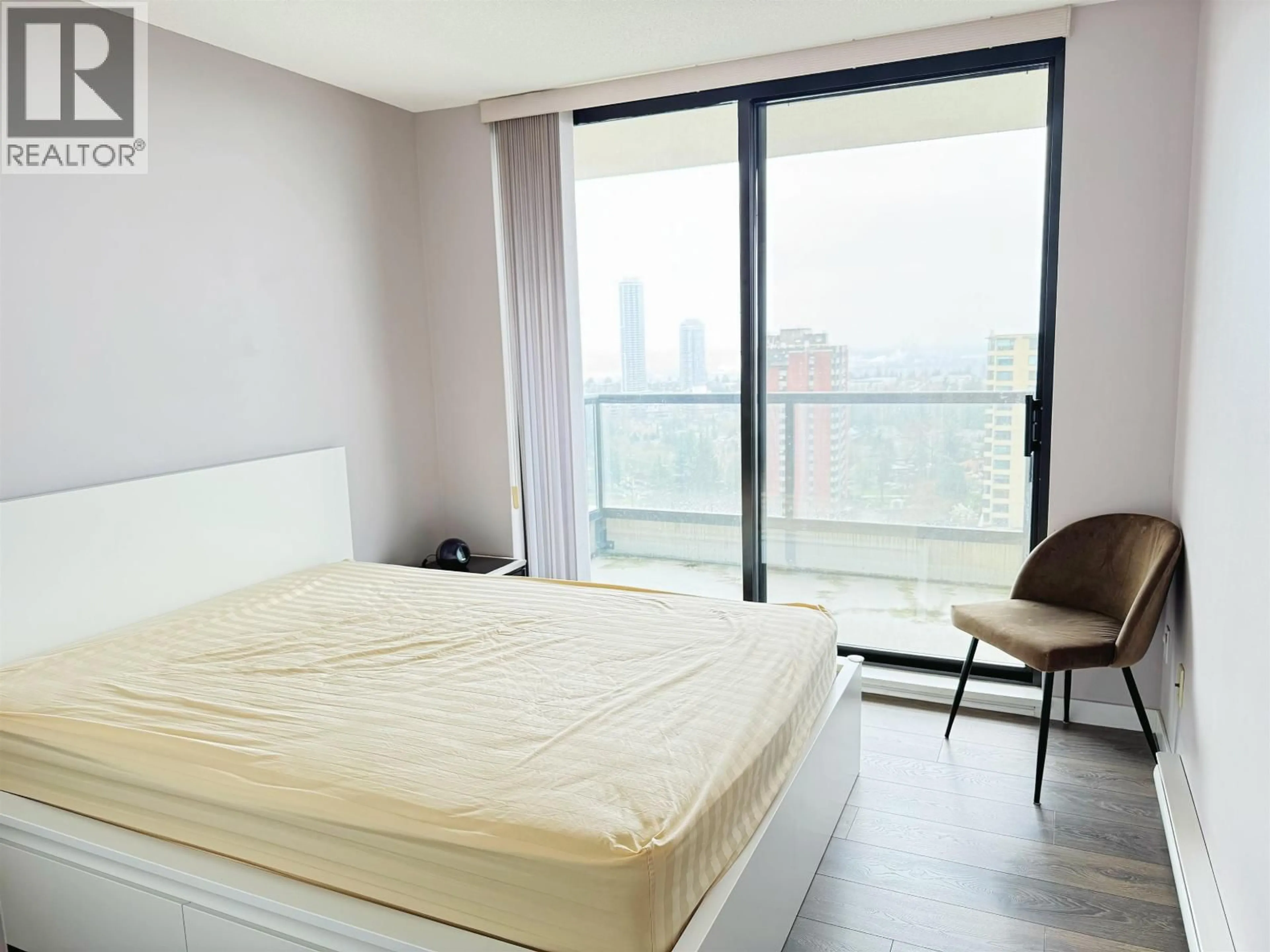 Bedroom with bed, wood/laminate floor for 1606 - 7063 HALL AVENUE, Burnaby British Columbia V5E0A5