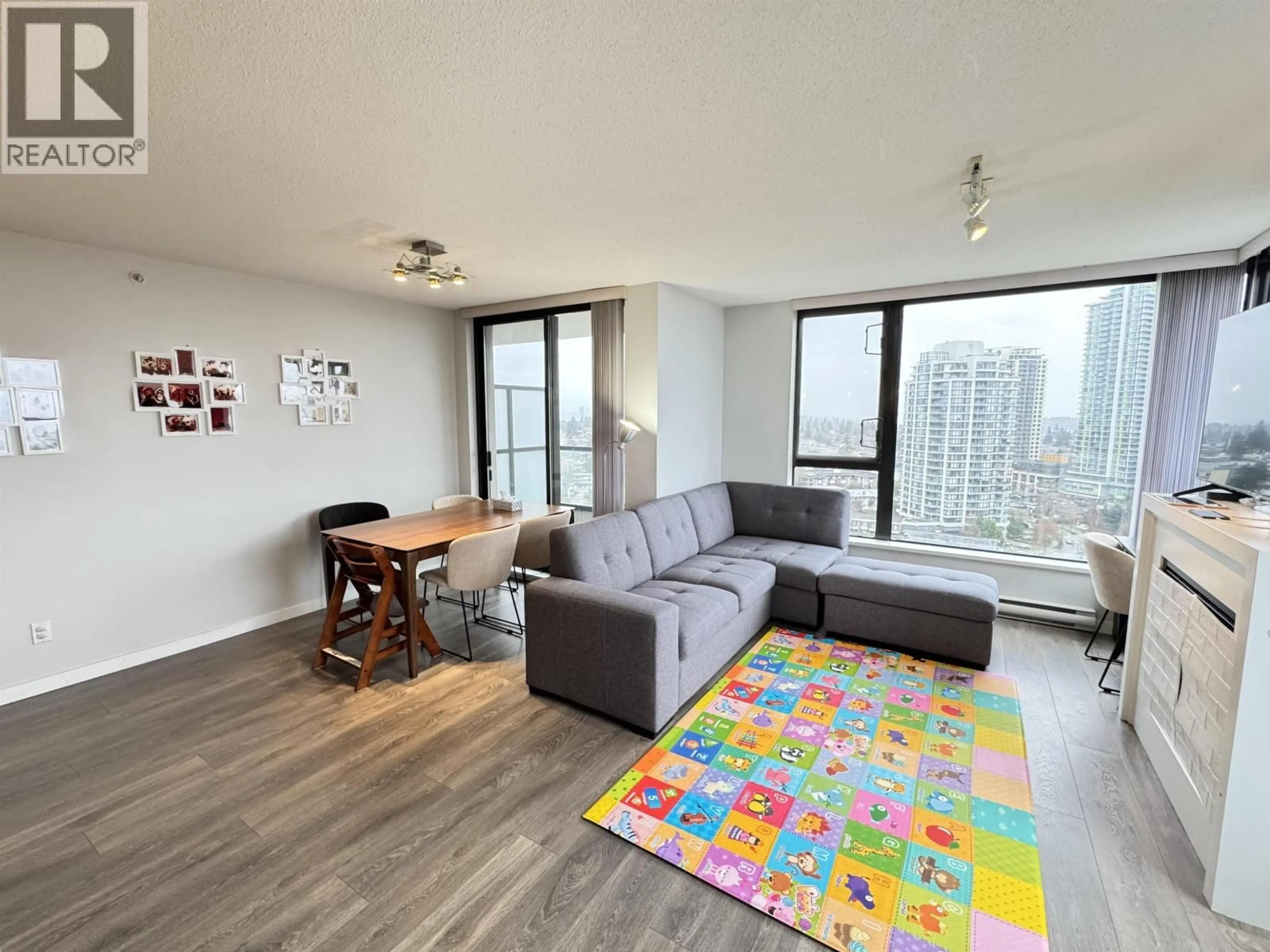 Living room with furniture, wood/laminate floor for 1606 - 7063 HALL AVENUE, Burnaby British Columbia V5E0A5