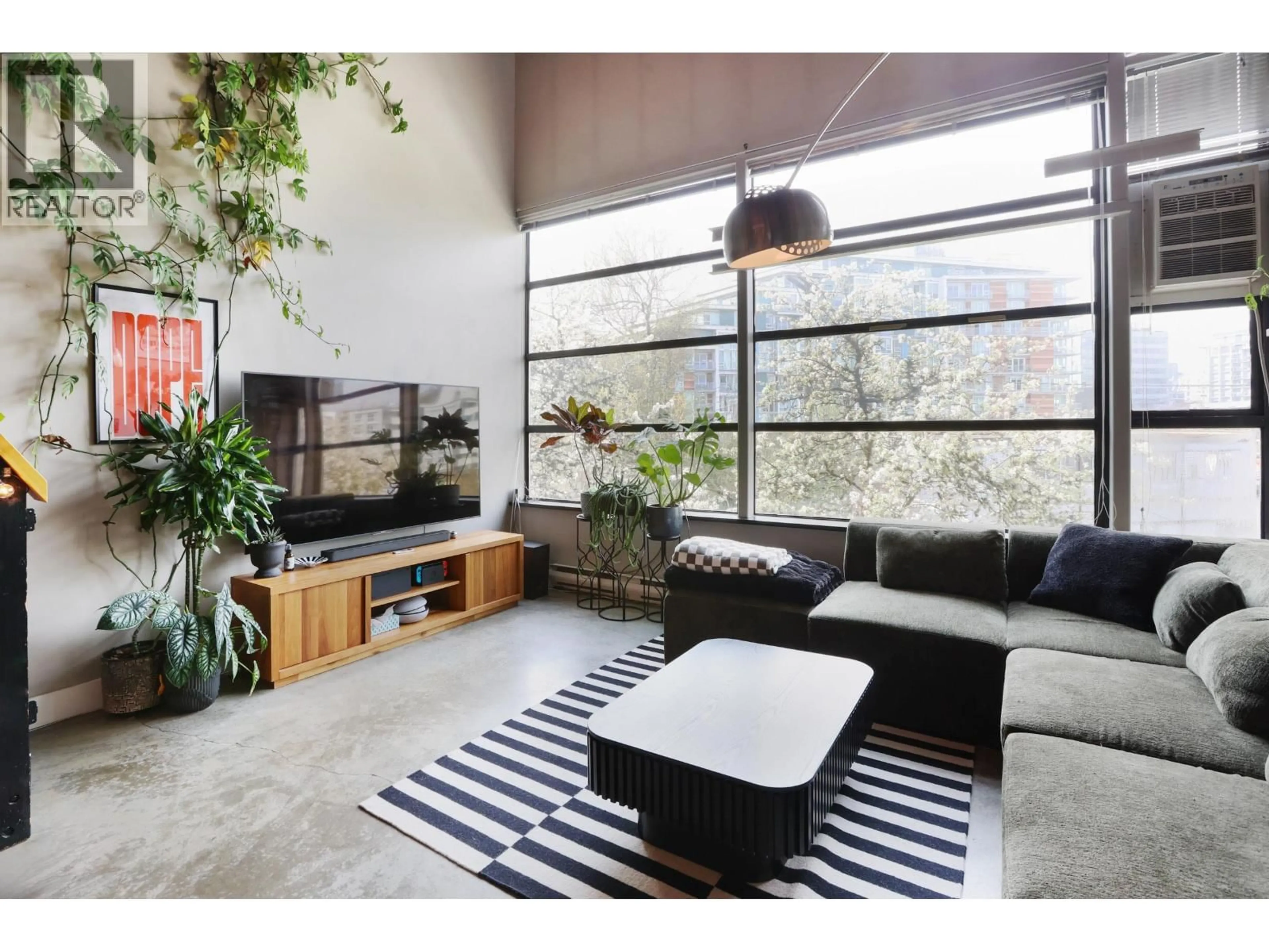 Living room with furniture, unknown for 203 - 1850 LORNE STREET, Vancouver British Columbia V5T1C9