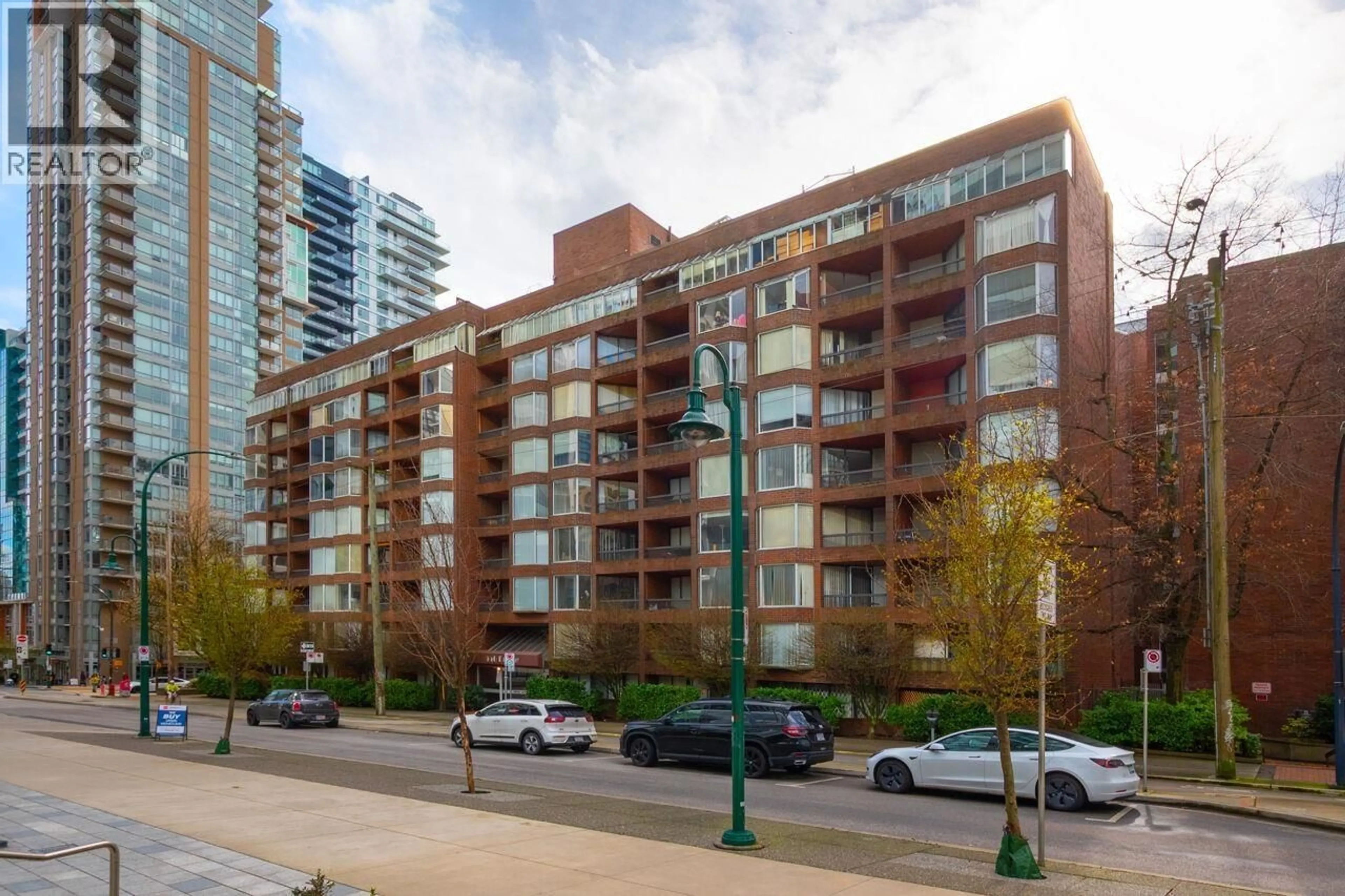 Patio, city buildings view from balcony for 211 - 950 DRAKE STREET, Vancouver British Columbia V6Z2B9