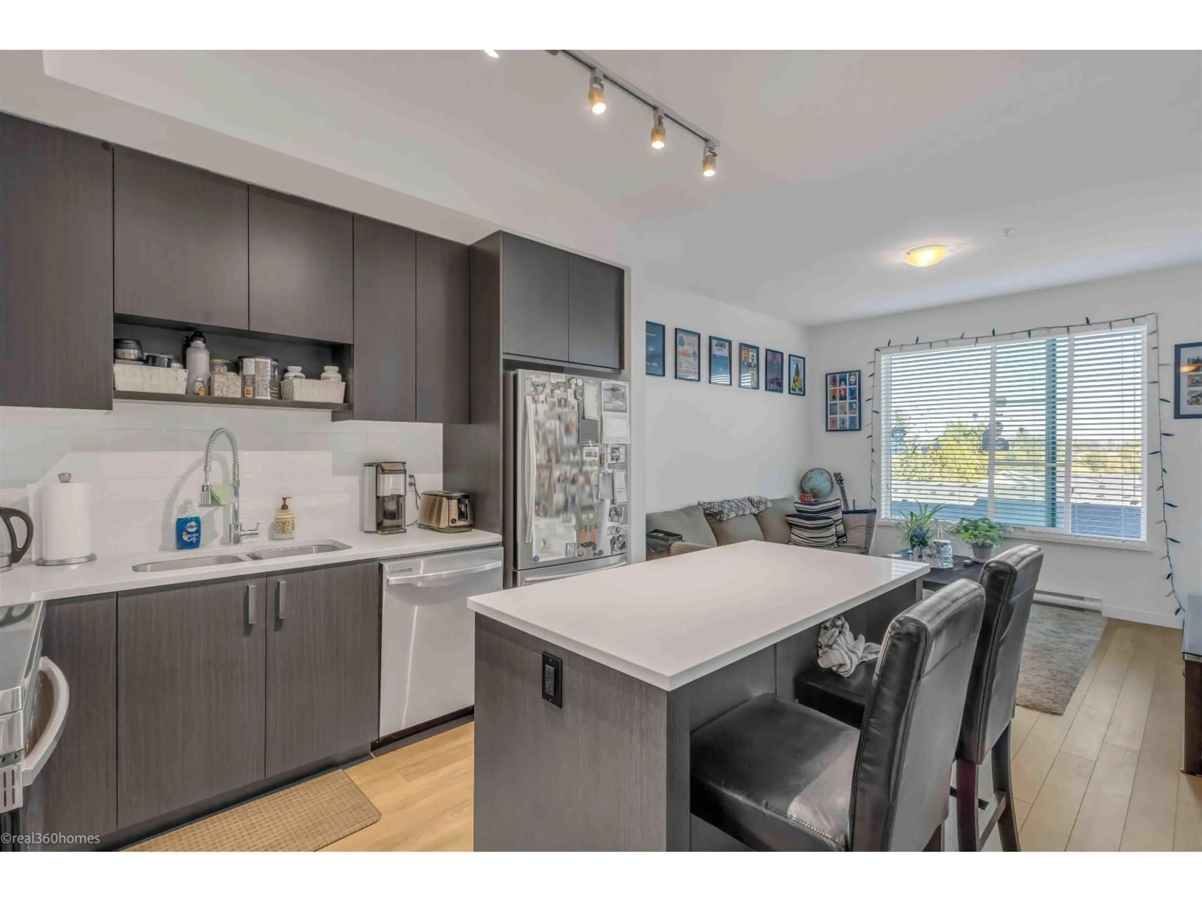Open concept kitchen, unknown for 313 - 13623 81A AVENUE, Surrey British Columbia V3W3N7