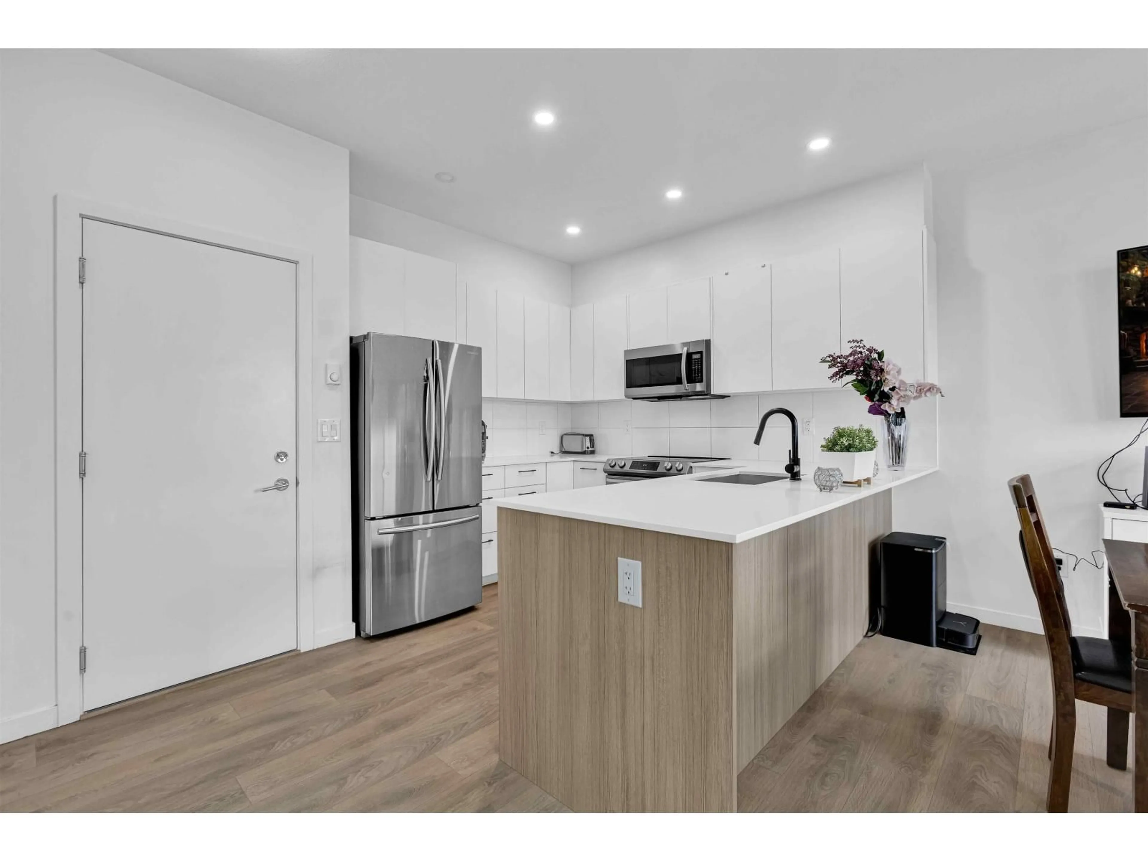 Open concept kitchen, wood/laminate floor for 79 - 15255 SITKA DR DRIVE, Surrey British Columbia V3S0B1