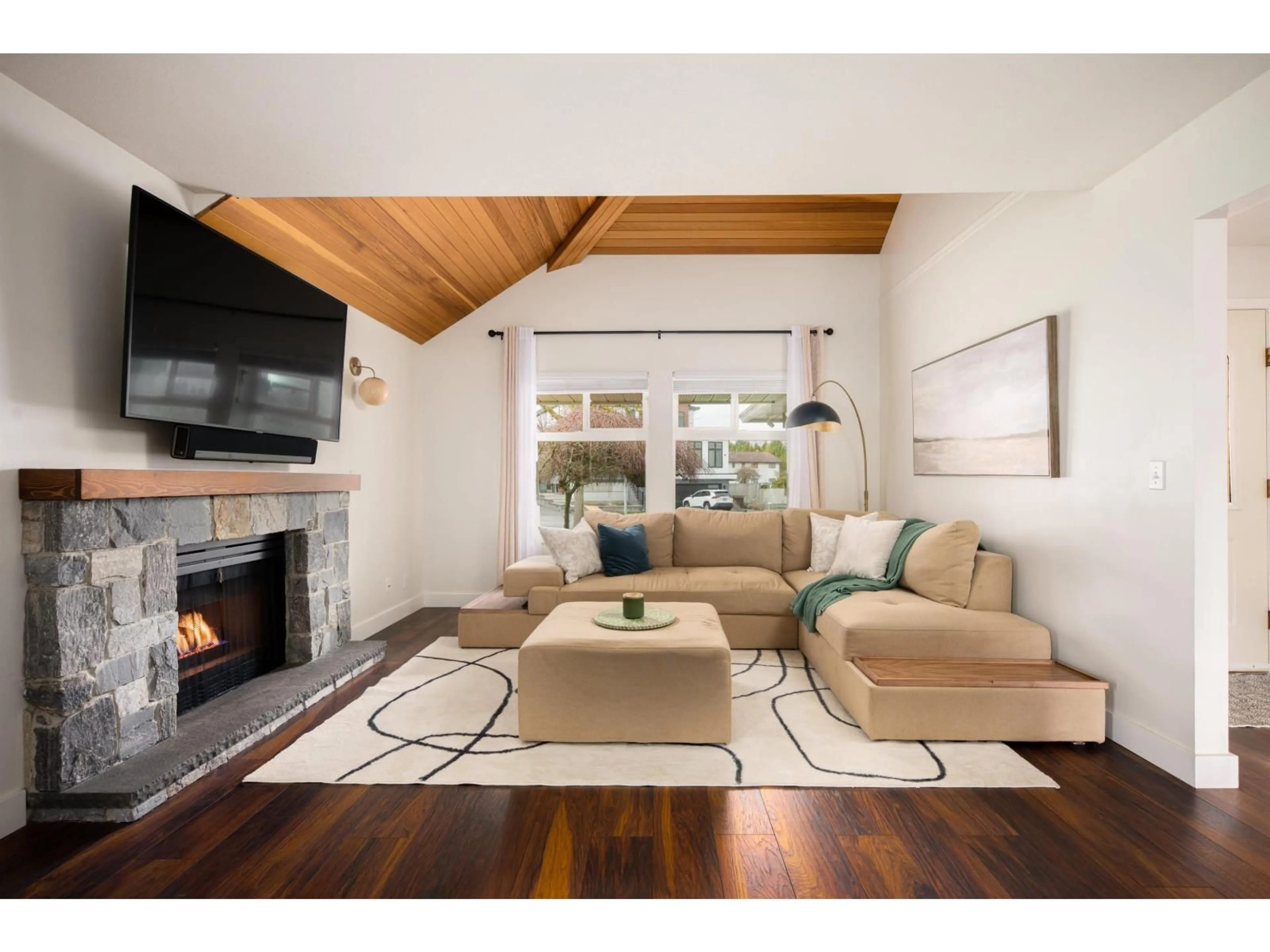 Living room with furniture, wood/laminate floor for 8572 164A STREET, Surrey British Columbia V4N3G8