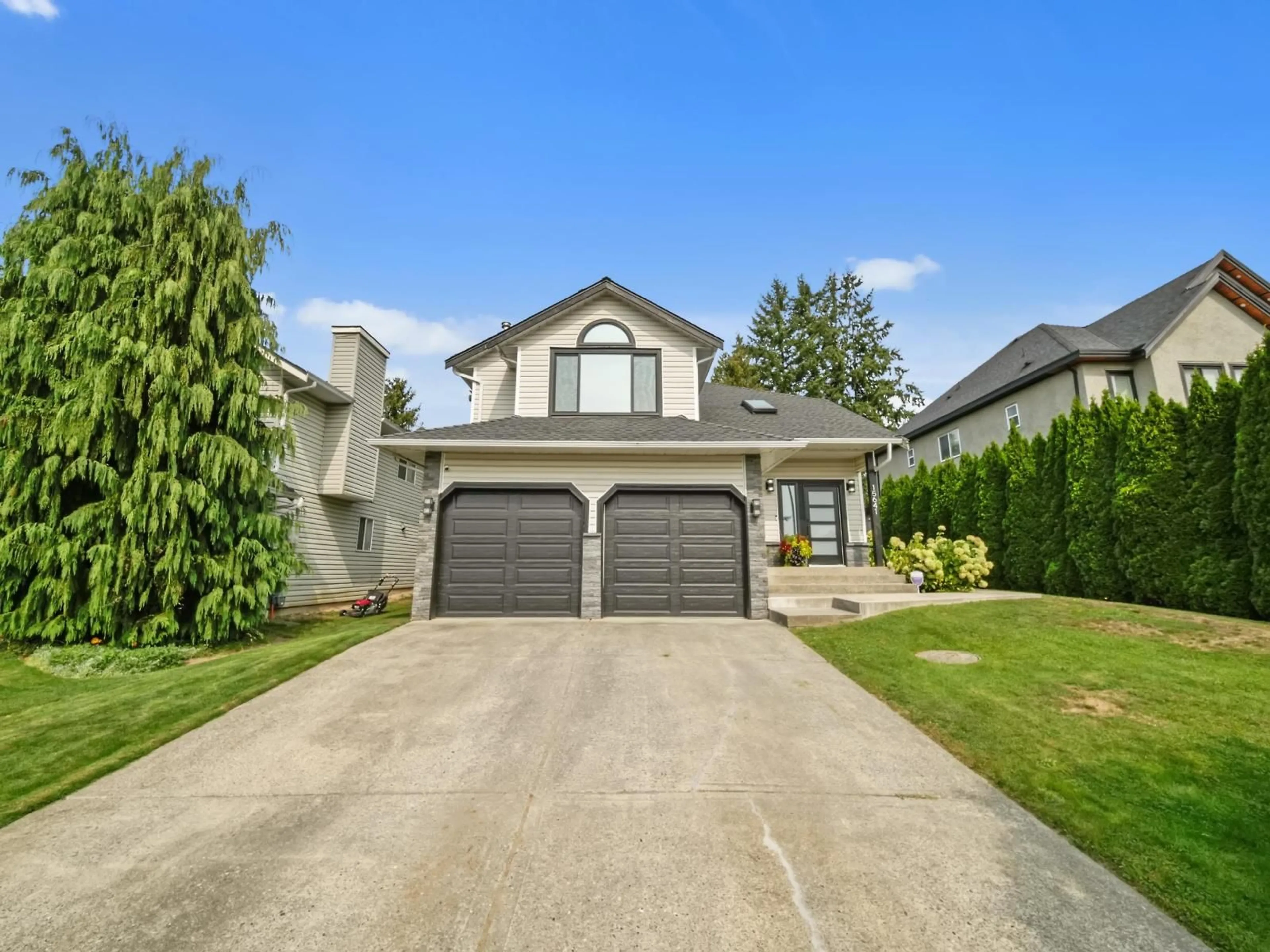 Home with vinyl exterior material, street for 15641 107 AVENUE, Surrey British Columbia V4N3H8