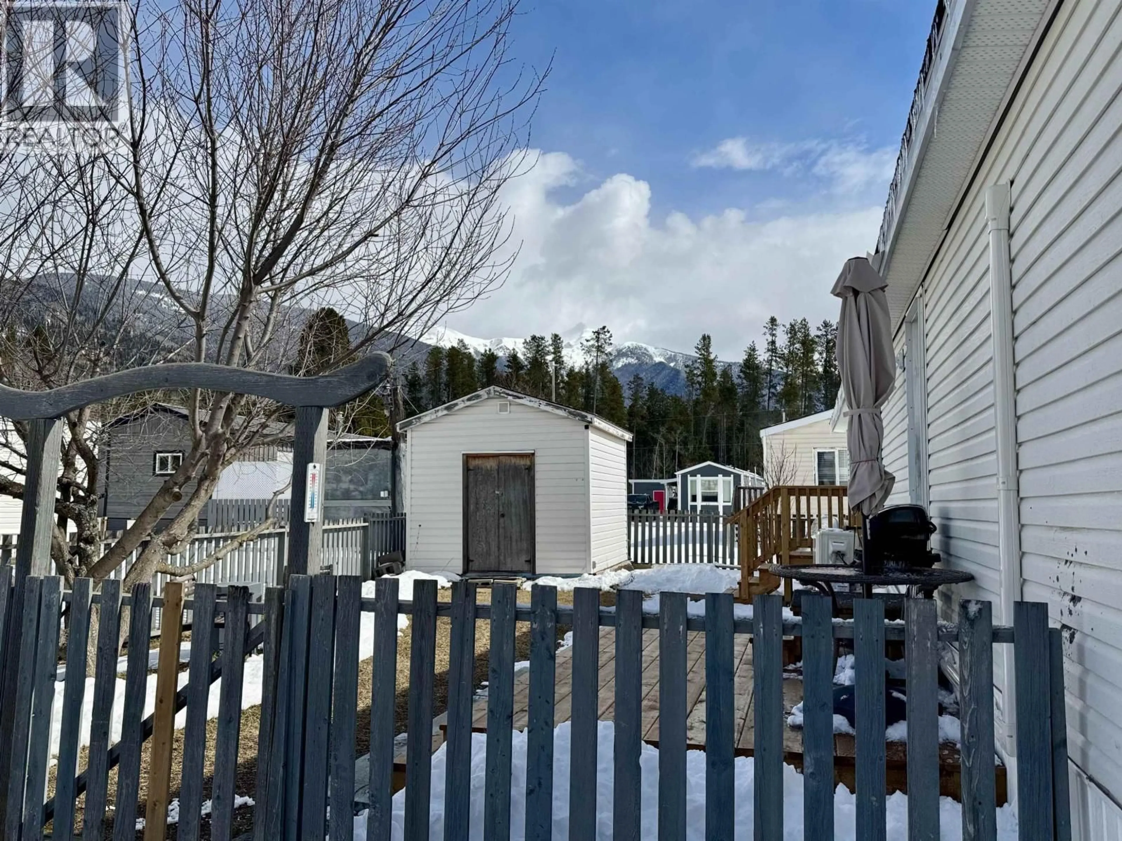 A pic from outside/outdoor area/front of a property/back of a property/a pic from drone, mountain view for 12 - 955 13TH AVENUE, Valemount British Columbia V0E2Z0
