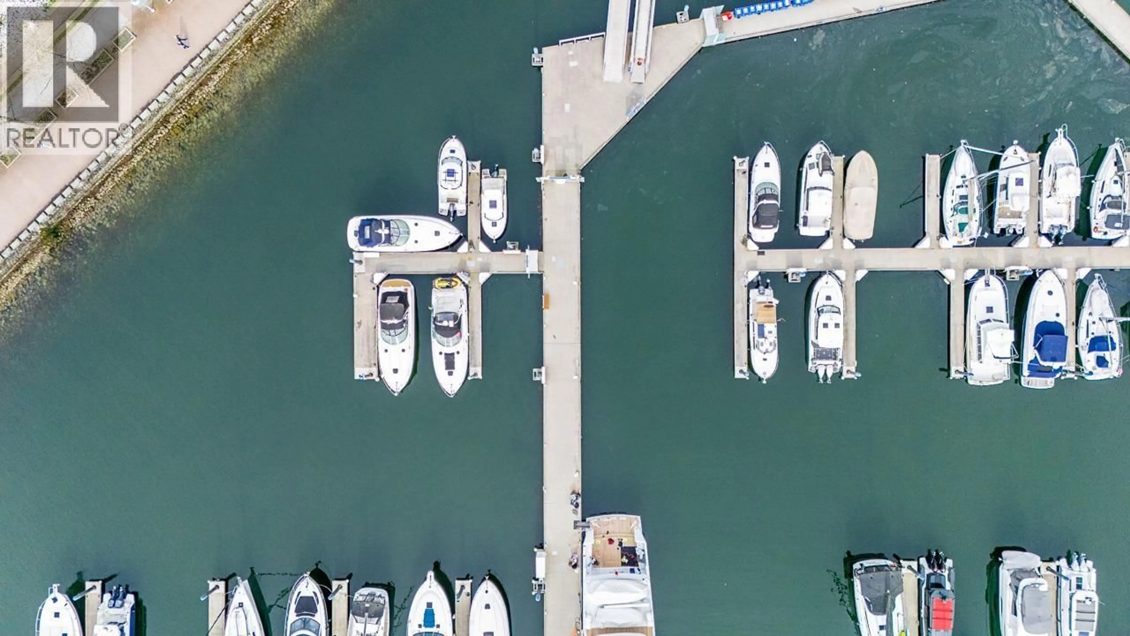 A pic from outside/outdoor area/front of a property/back of a property/a pic from drone, water/lake/river/ocean view for D7 - 1088 MARINASIDE CRESCENT, Vancouver British Columbia V6Z3C4