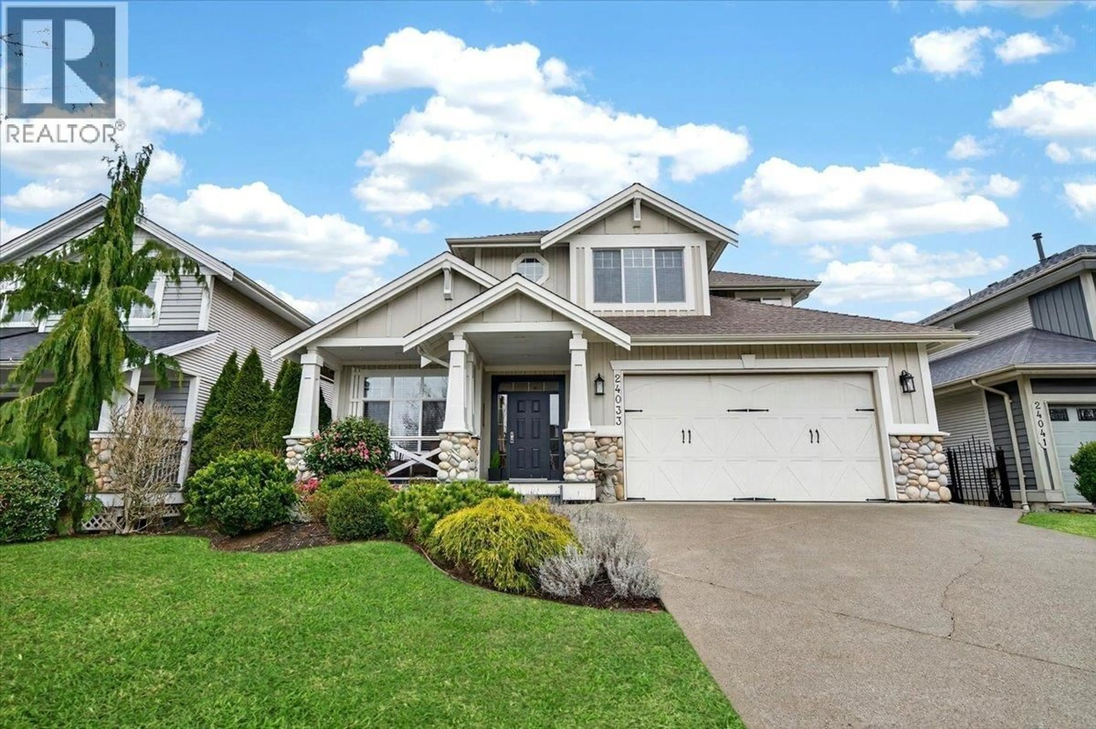 Home with vinyl exterior material, street for 24033 106TH AVENUE, Maple Ridge British Columbia V2W2B1