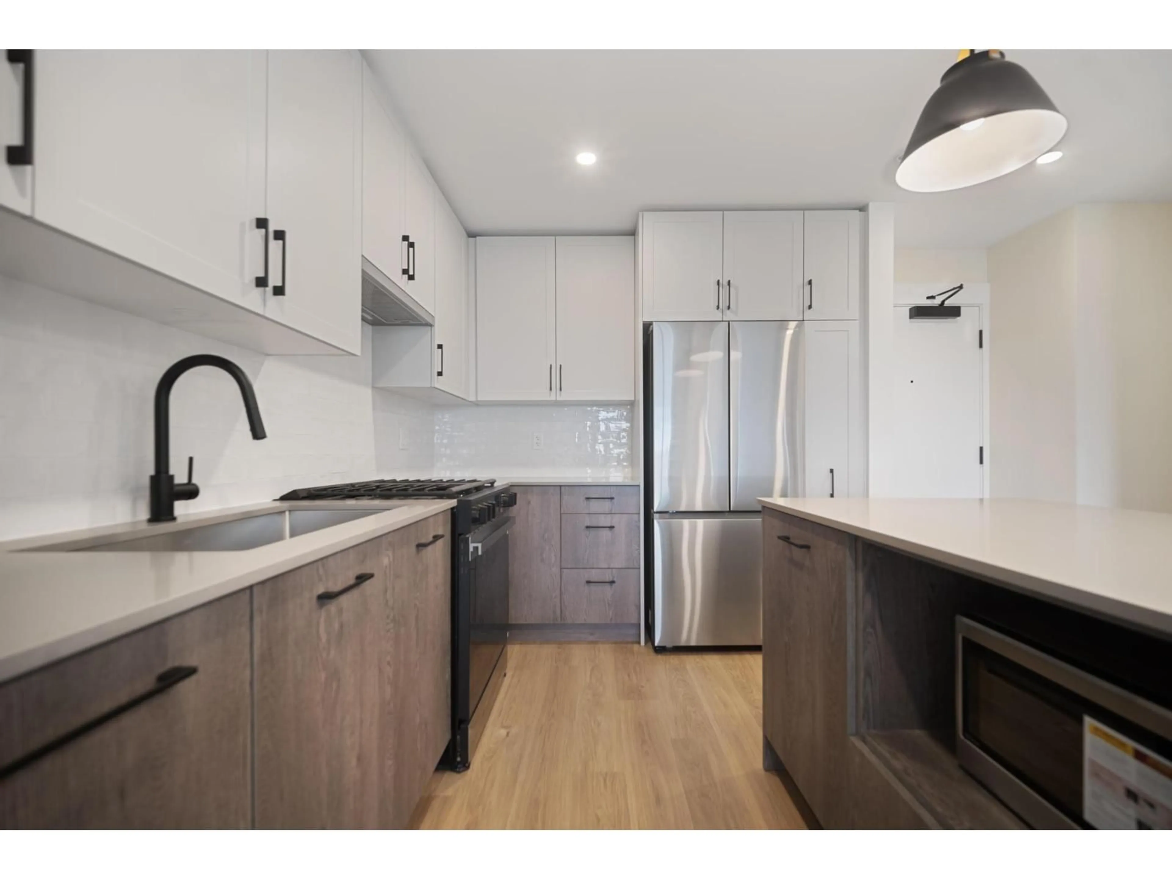 Open concept kitchen, unknown for 503 - 27215 ALDERGROVE TOWN CENTRE DRIVE, Langley British Columbia V4W0E3