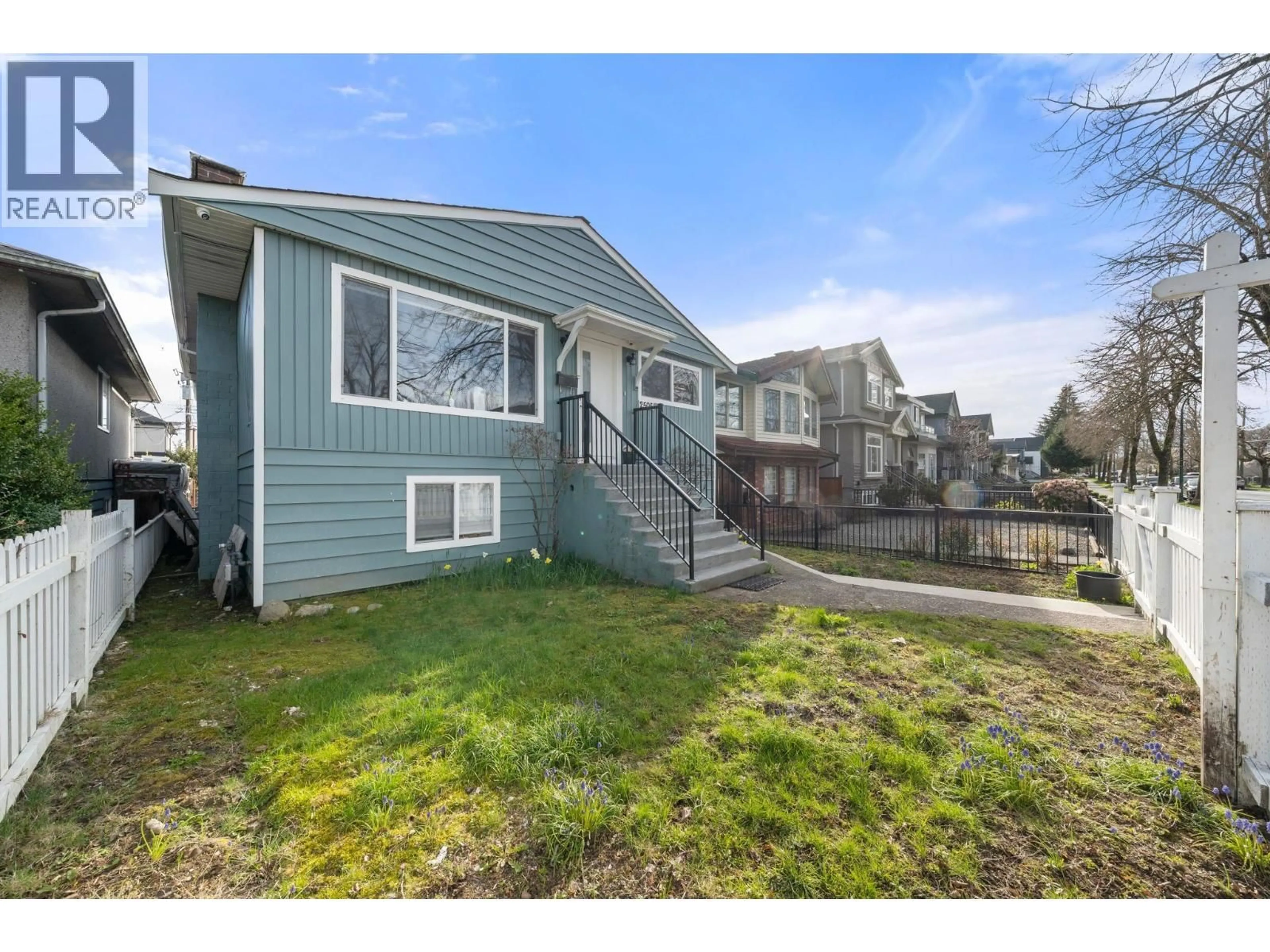 Home with vinyl exterior material, street for 2506 45TH AVENUE, Vancouver British Columbia V5R3B5