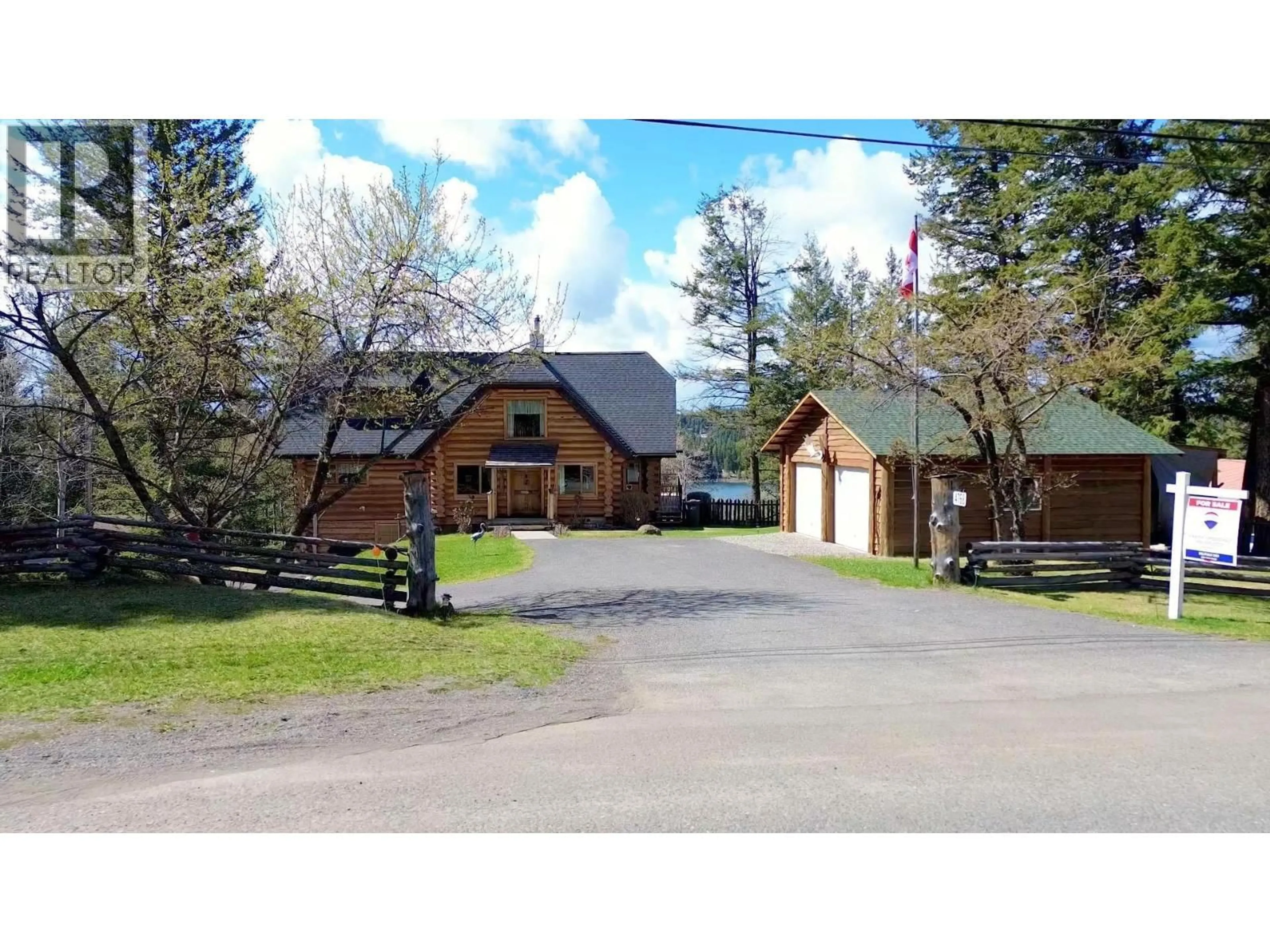 A pic from outside/outdoor area/front of a property/back of a property/a pic from drone, mountain view for 4768 TELQUA DRIVE, 108 Mile Ranch British Columbia V0K2Z0