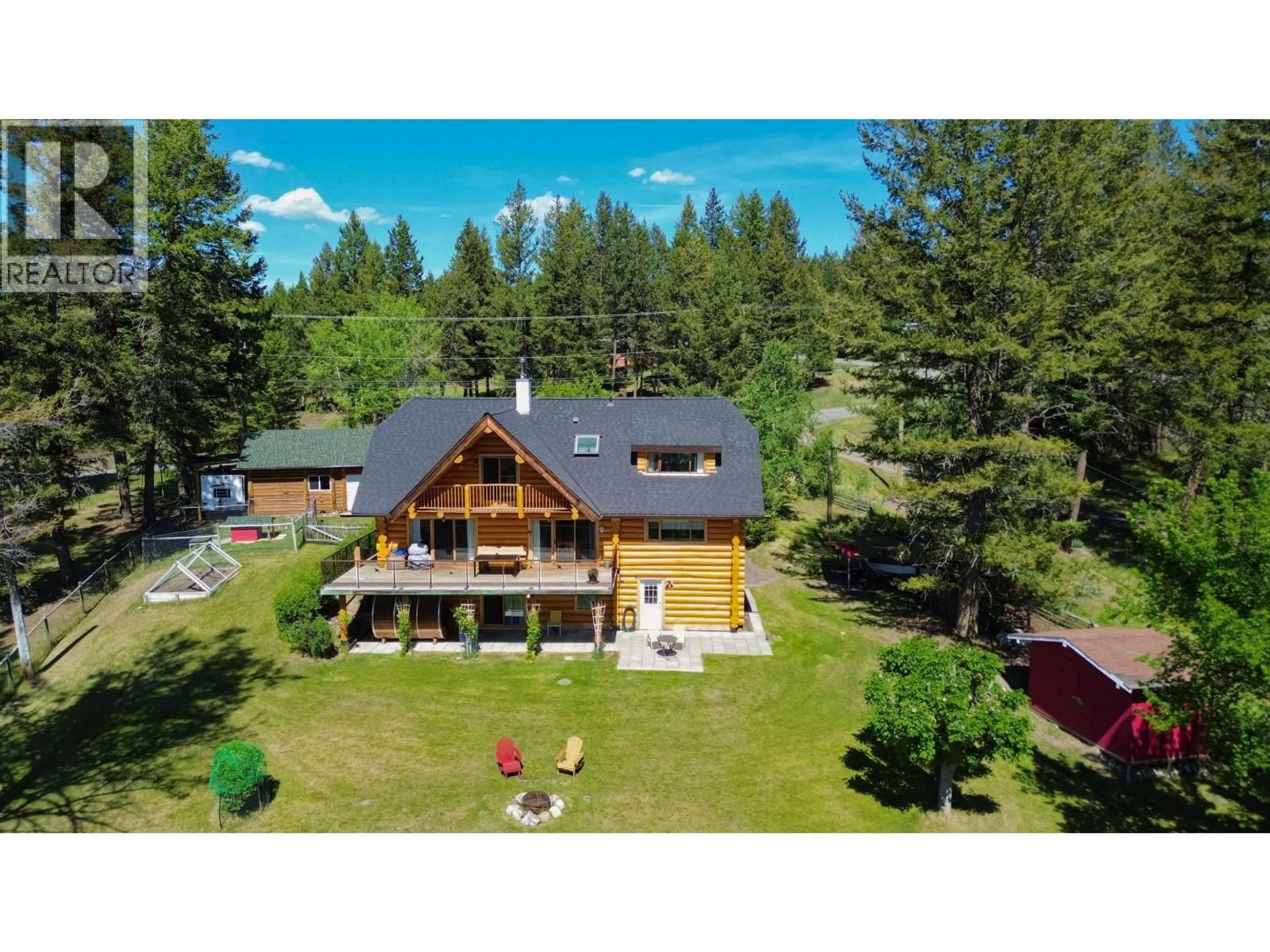 A pic from outside/outdoor area/front of a property/back of a property/a pic from drone, unknown for 4768 TELQUA DRIVE, 108 Mile Ranch British Columbia V0K2Z0