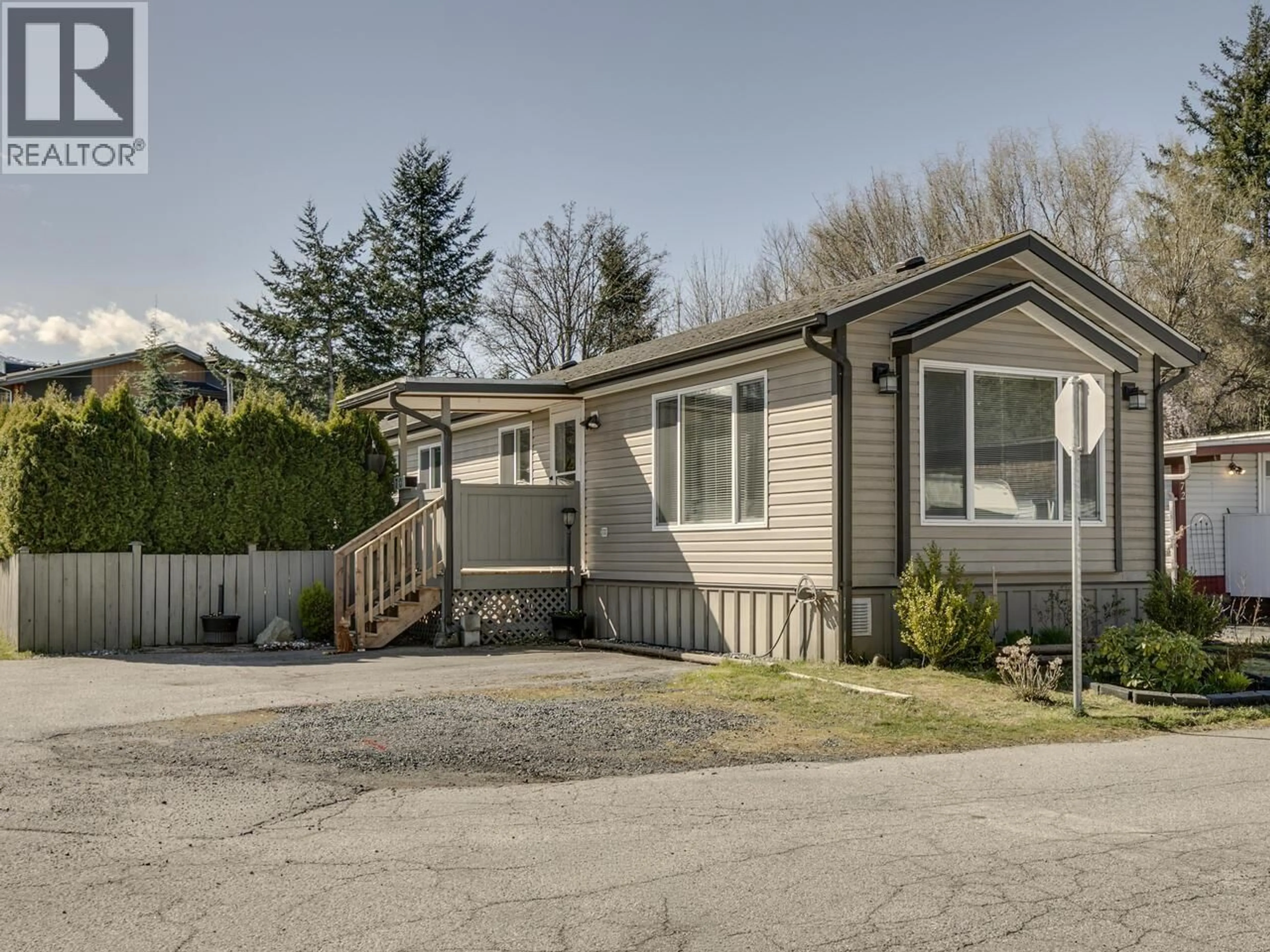 Home with vinyl exterior material, street for 70 - 40157 GOVERNMENT ROAD, Squamish British Columbia V0N1T0