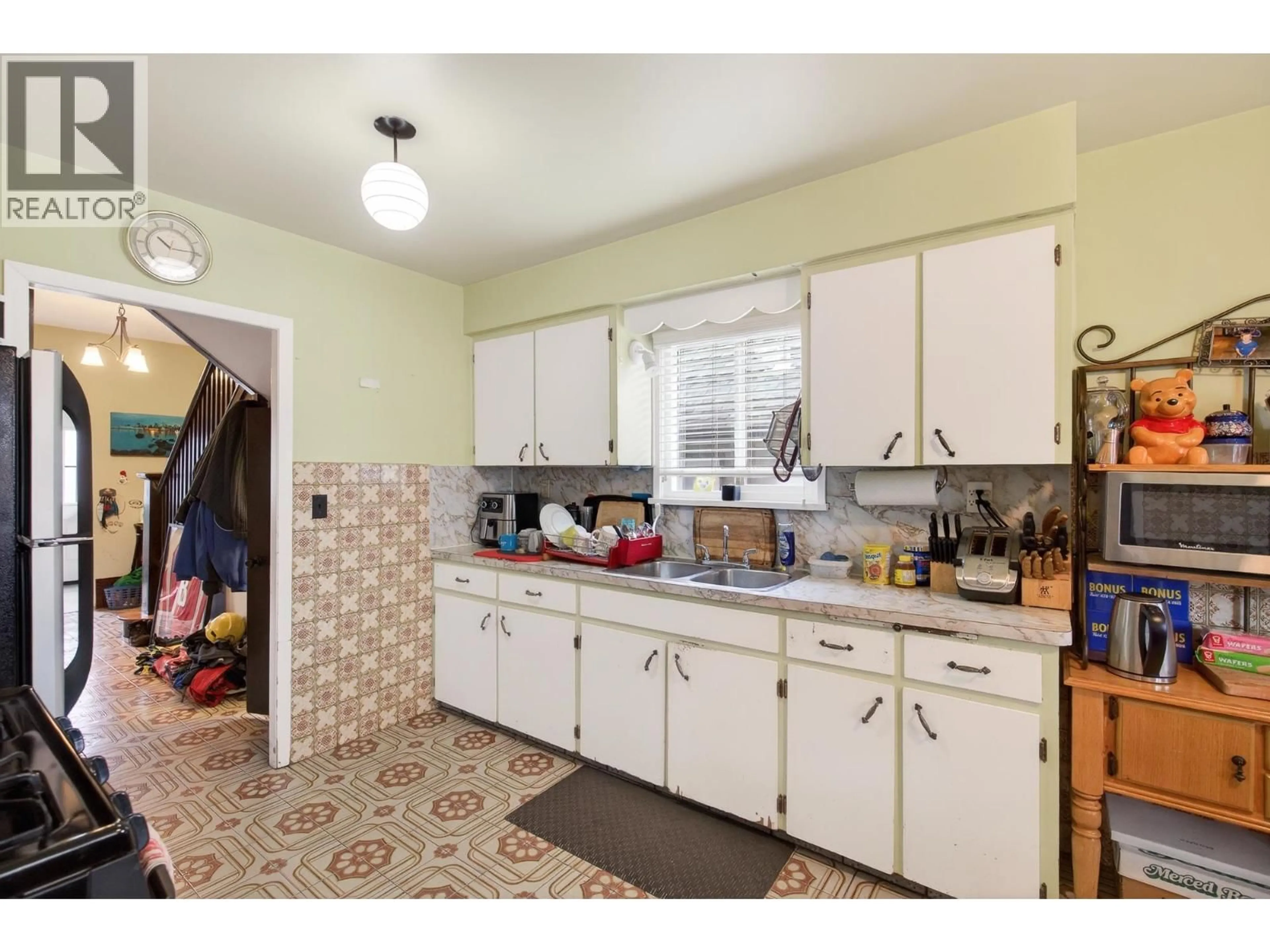 Standard kitchen, ceramic/tile floor for 2631 PENDER STREET, Vancouver British Columbia V5K2B6
