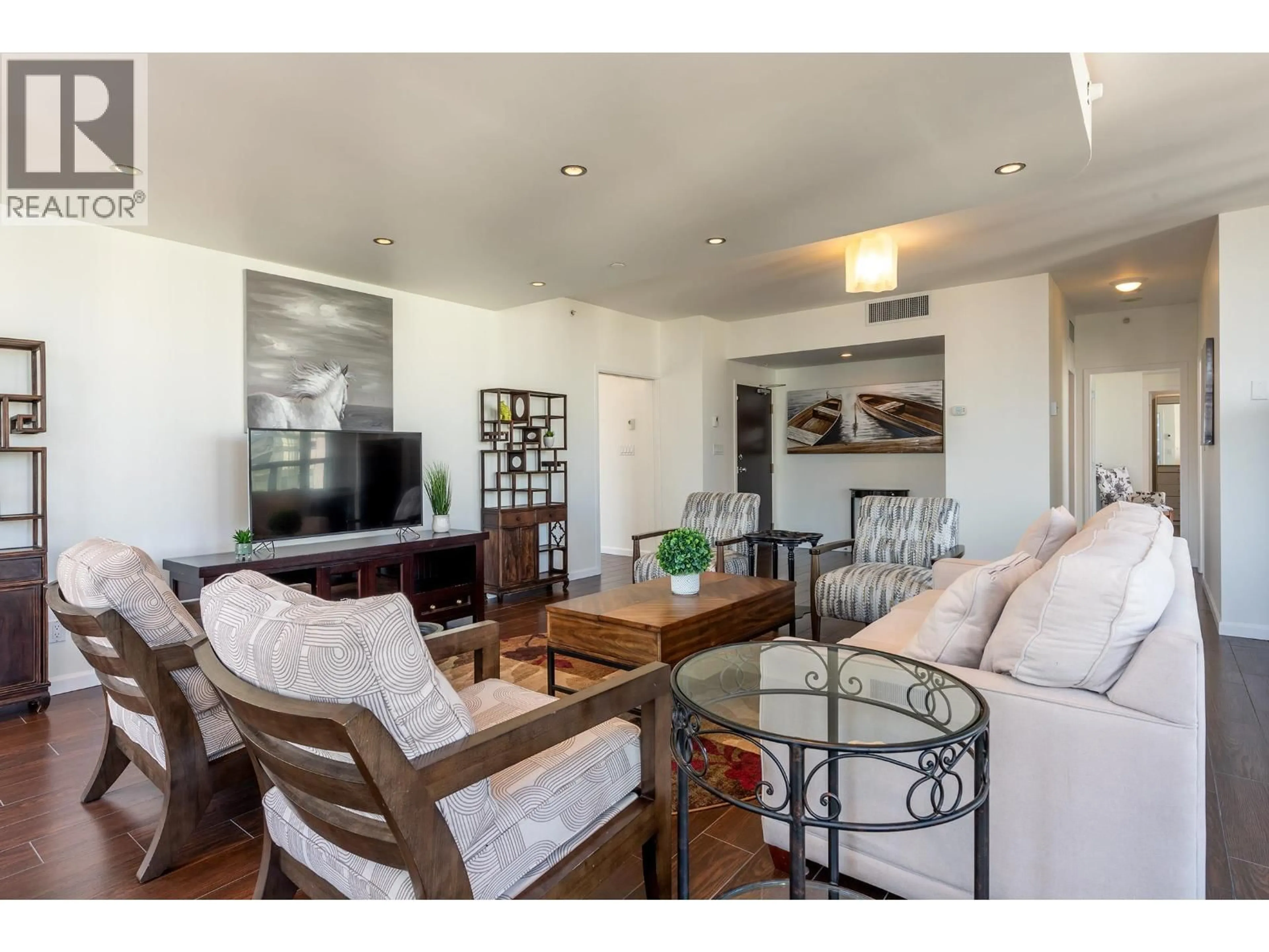 Living room with furniture, wood/laminate floor for 2902 - 1166 MELVILLE STREET, Vancouver British Columbia V6E4P5