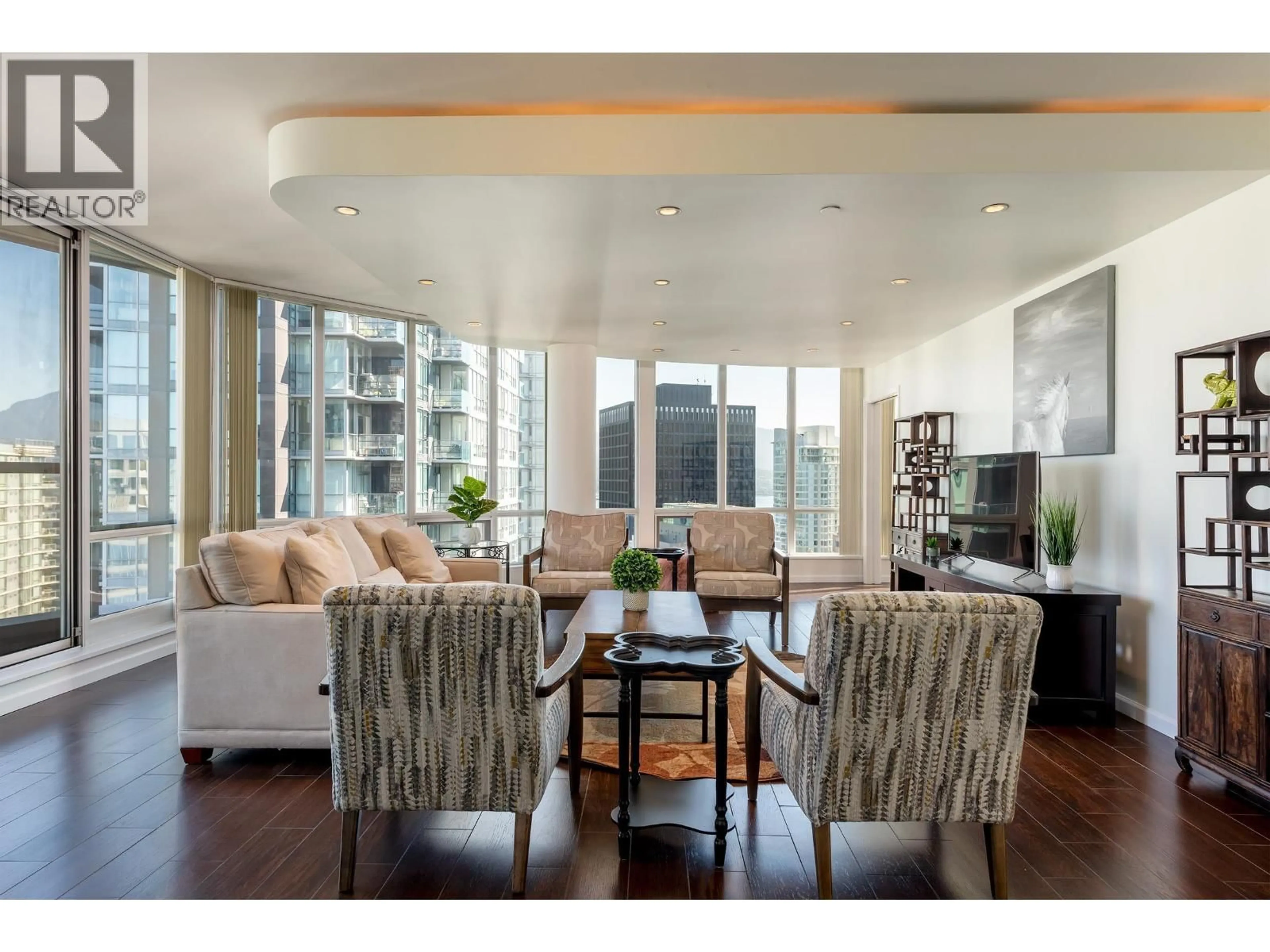 Living room with furniture, wood/laminate floor for 2902 - 1166 MELVILLE STREET, Vancouver British Columbia V6E4P5