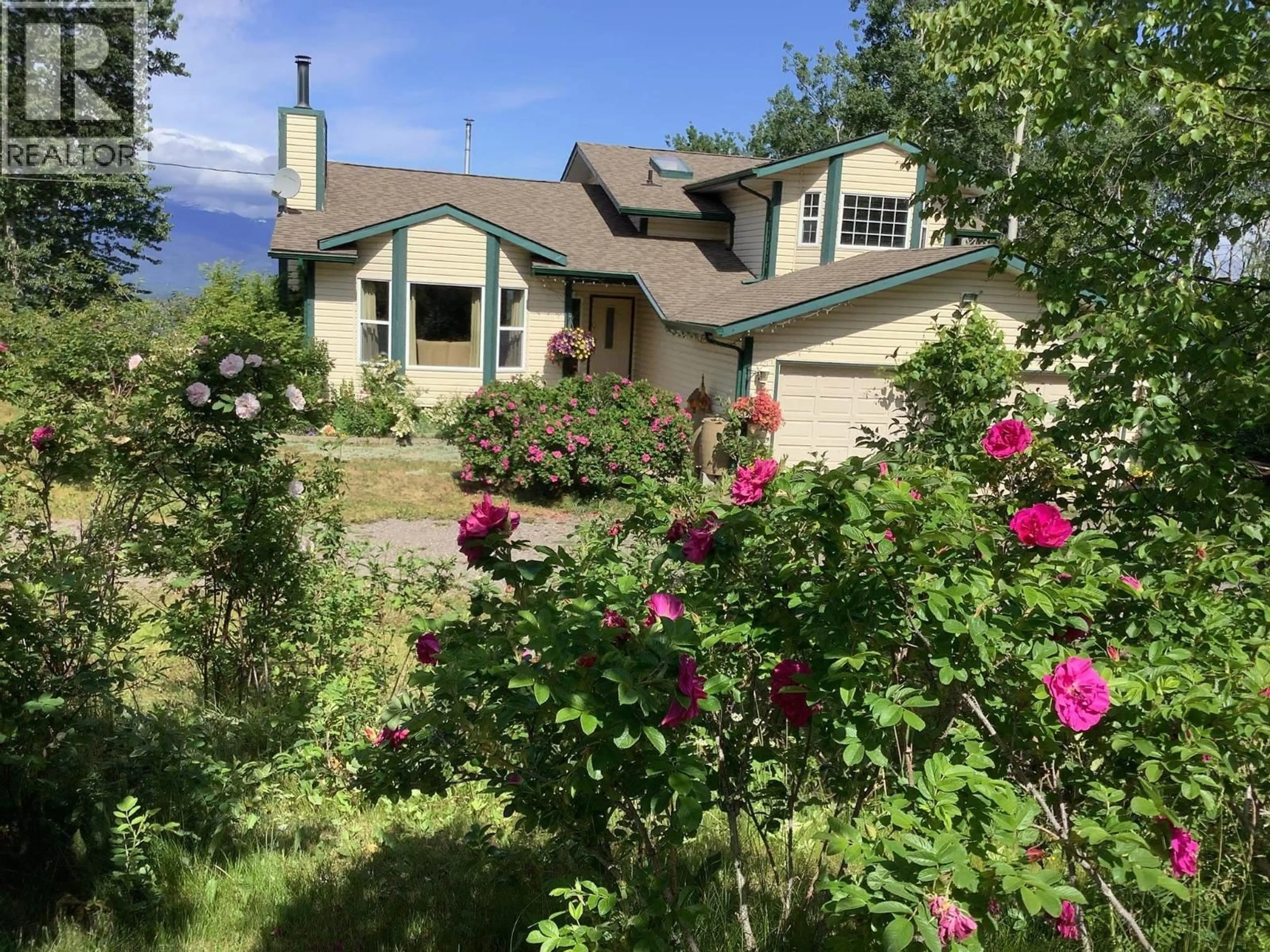 A pic from outside/outdoor area/front of a property/back of a property/a pic from drone, mountain view for 9312 BLUFF ROAD, Telkwa British Columbia V0J1X0