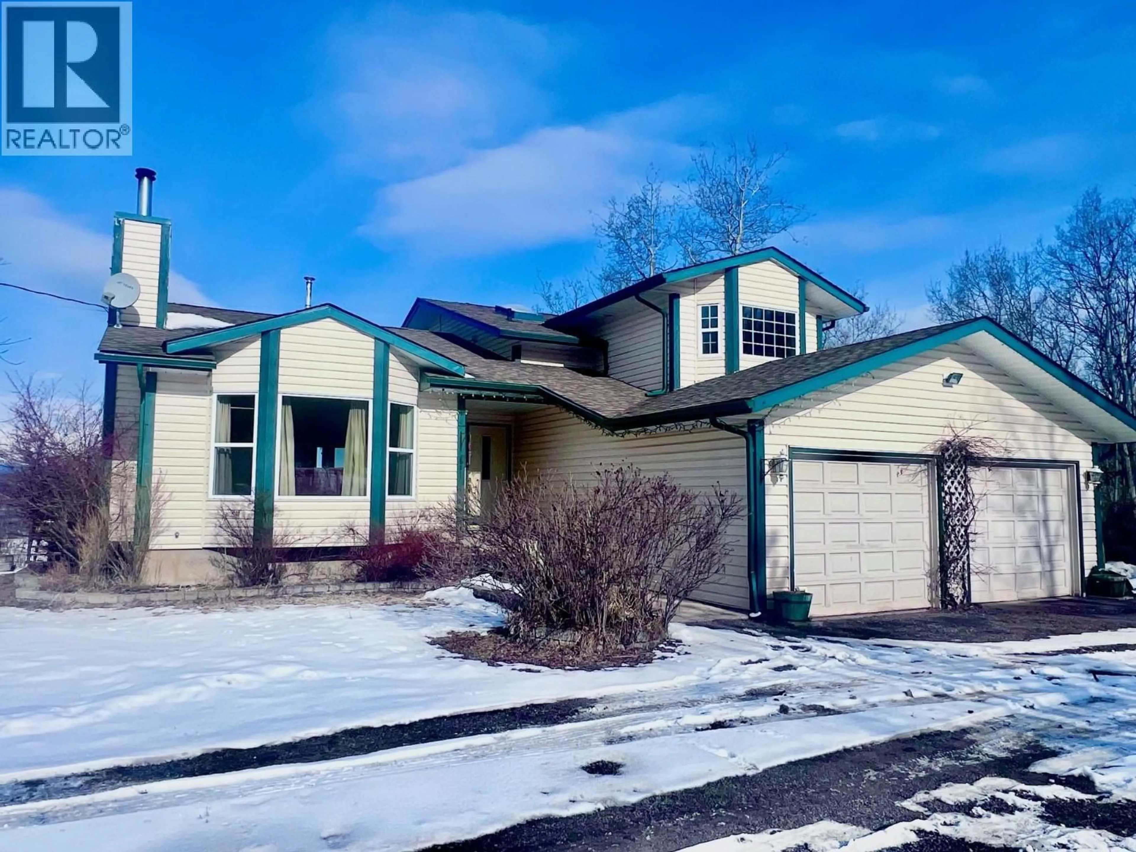 Home with vinyl exterior material, street for 9312 BLUFF ROAD, Telkwa British Columbia V0J1X0