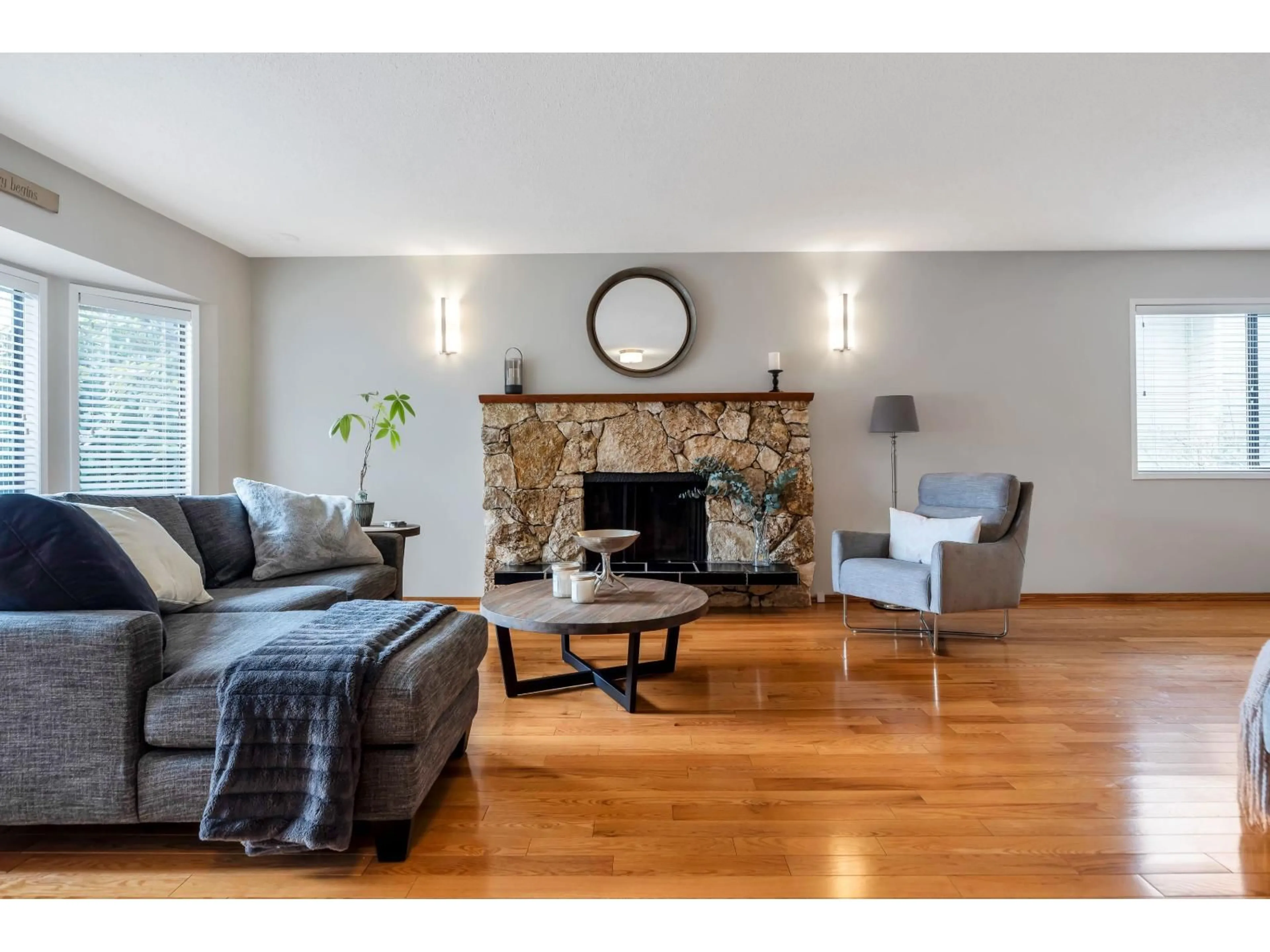 Living room with furniture, wood/laminate floor for 20495 TELEGRAPH TRAIL, Langley British Columbia V1M1A7