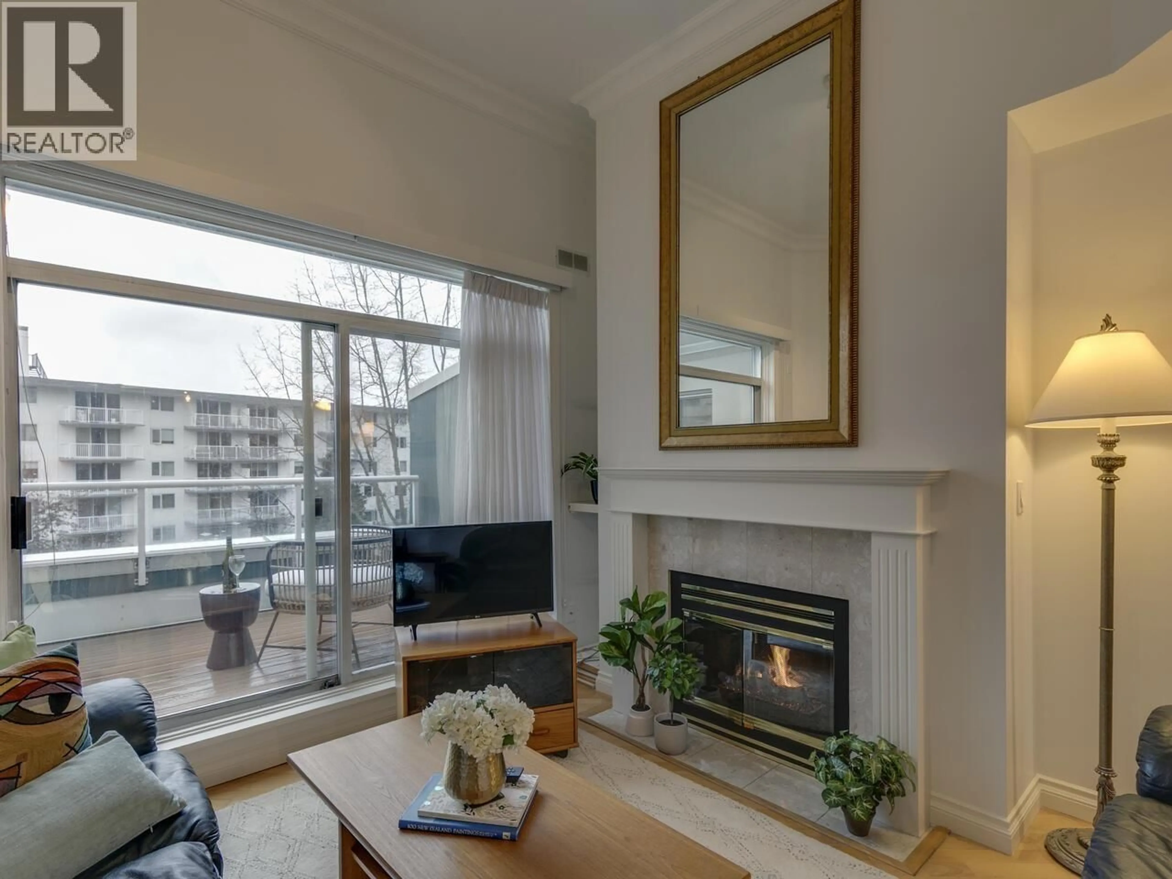 Living room with furniture, wood/laminate floor for 414 - 128 8TH STREET, North Vancouver British Columbia V7M3M1