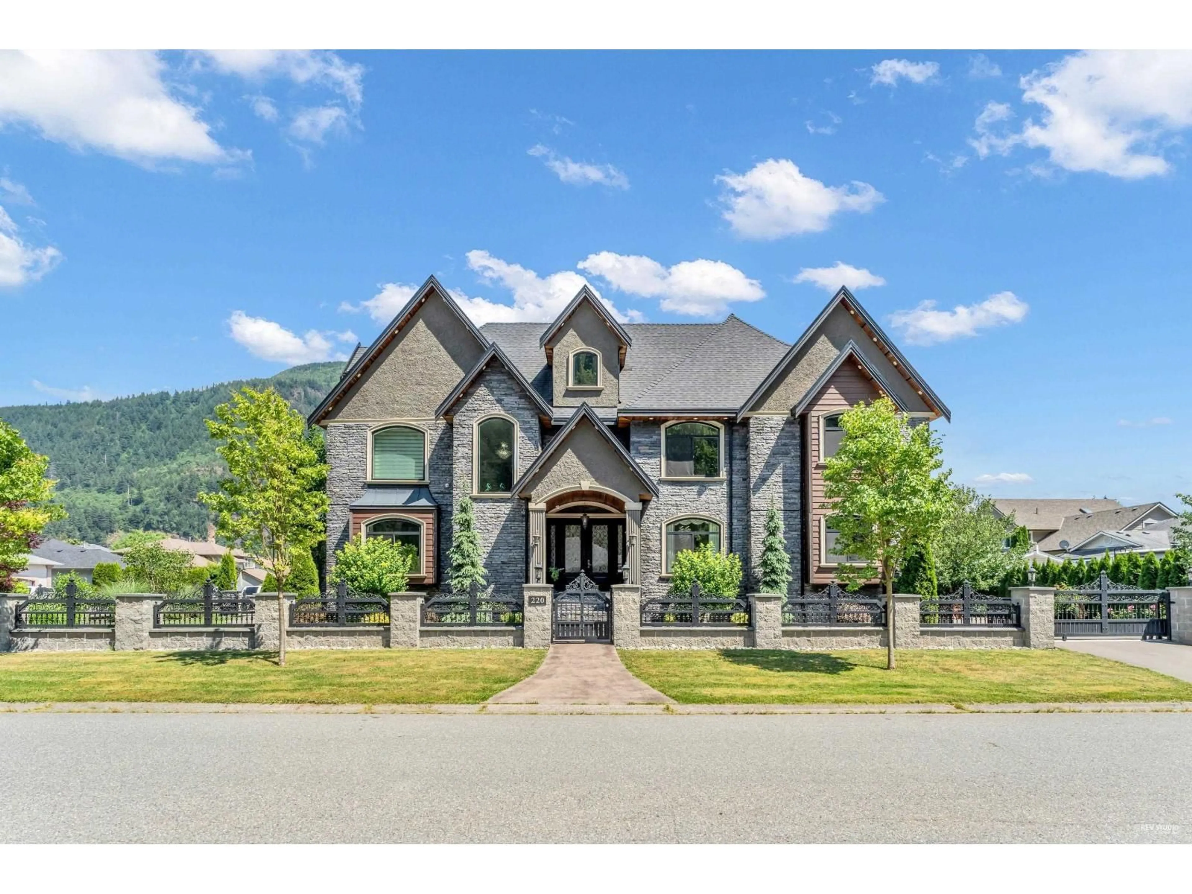 Home with brick exterior material, mountain view for 220 BALSAM AVENUE, Harrison Hot Springs British Columbia V0M1K0