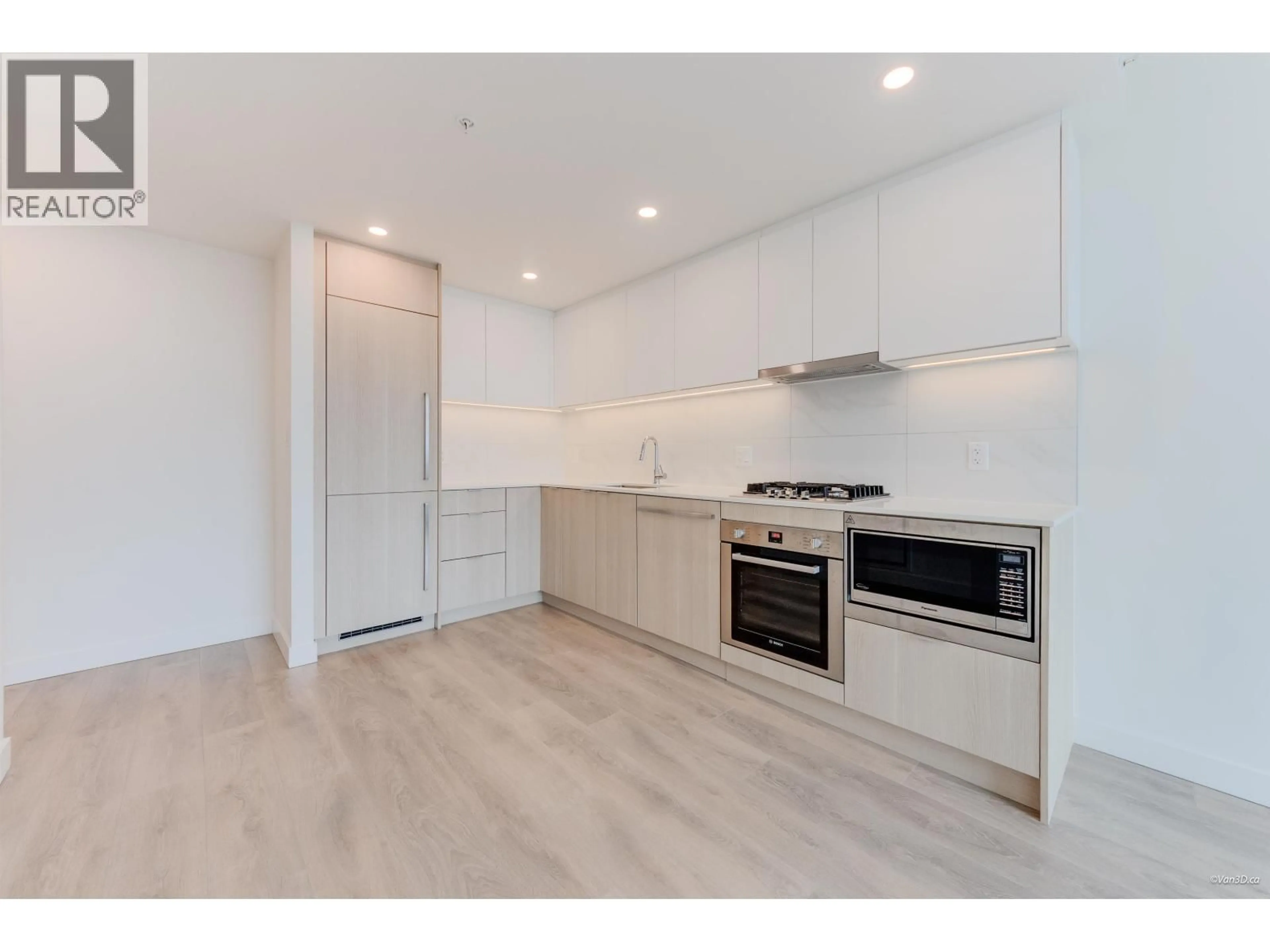 Open concept kitchen, wood/laminate floor for 1401 - 308 ALDERSON AVENUE, Coquitlam British Columbia V3K0J2