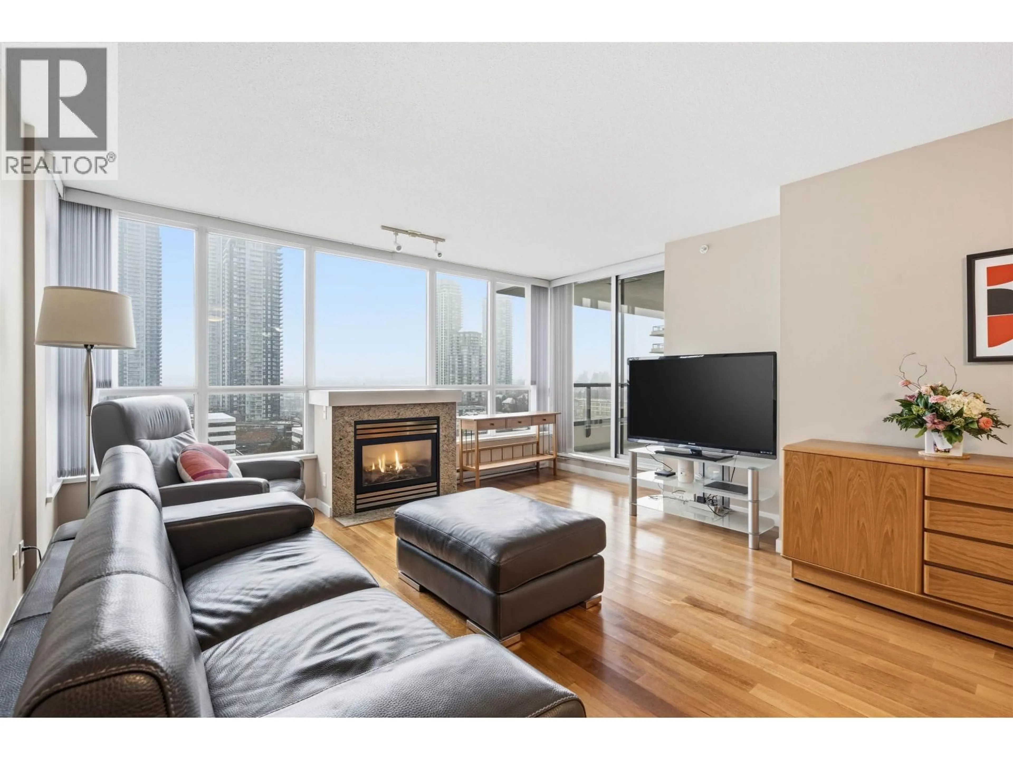 Living room with furniture, wood/laminate floor for 1504 - 2138 MADISON AVENUE, Burnaby British Columbia V5C6T6