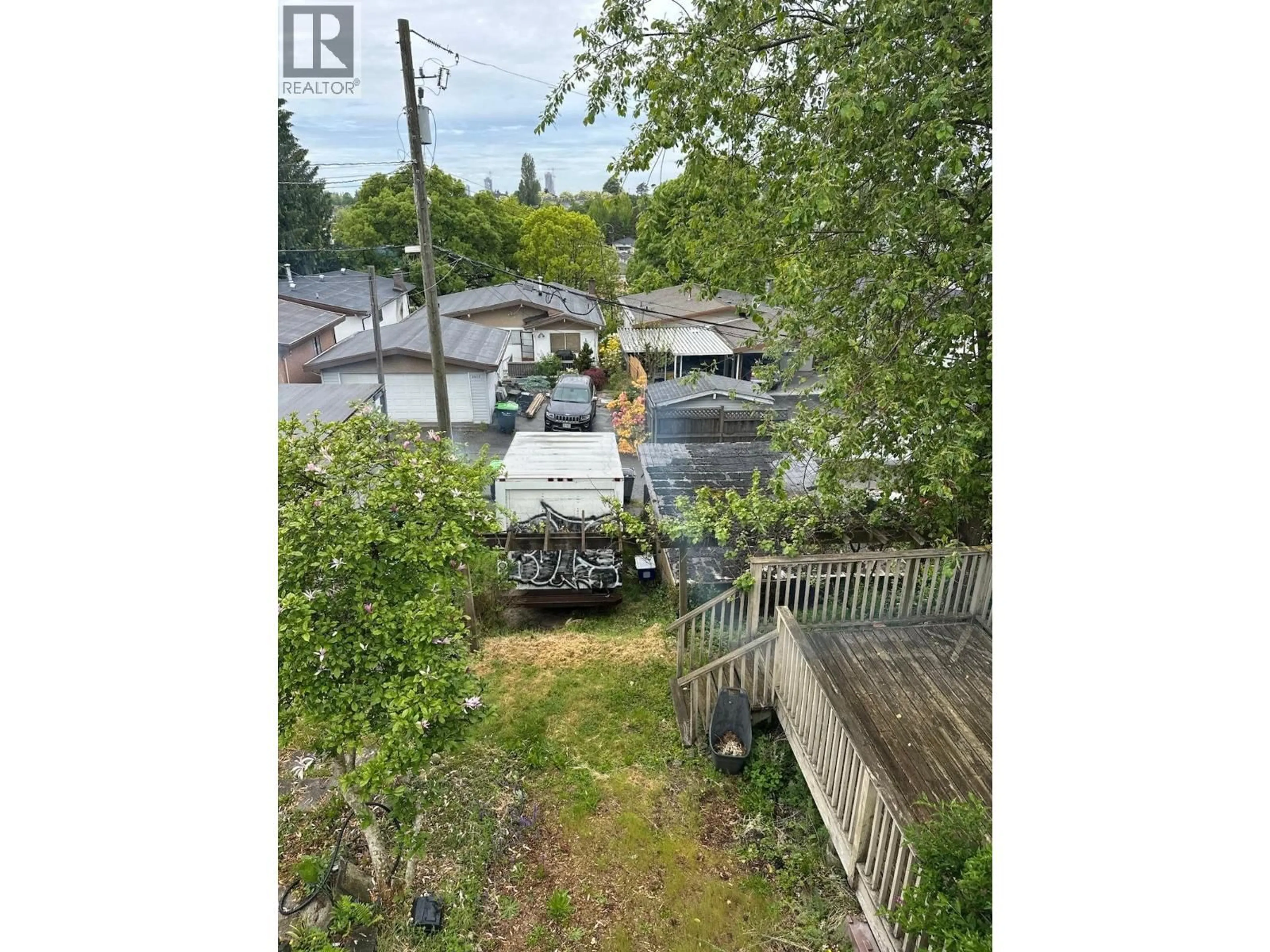 A pic from outside/outdoor area/front of a property/back of a property/a pic from drone, street for 5635 FLEMING STREET, Vancouver British Columbia V5P3G1