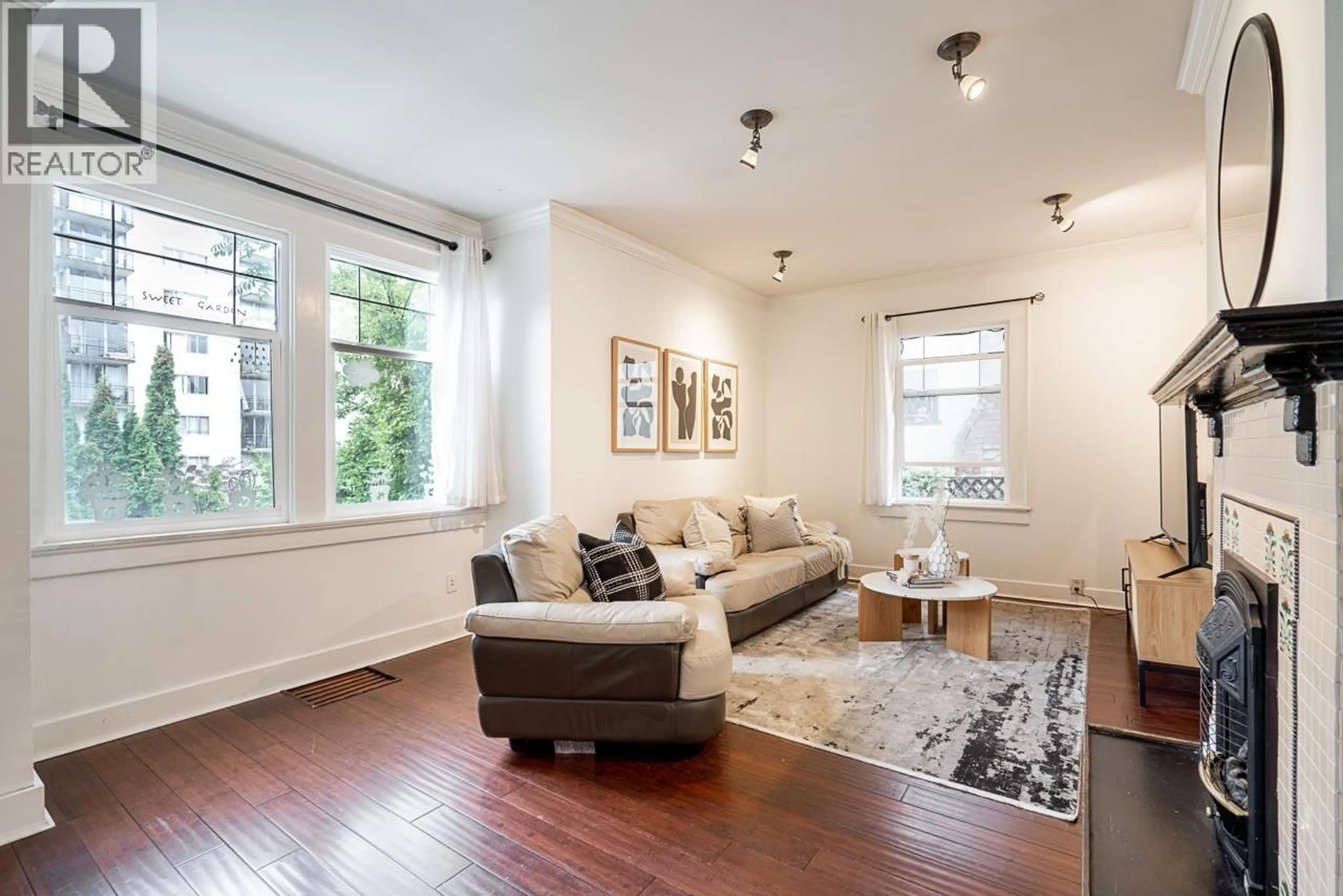 Living room with furniture, wood/laminate floor for 202 SEVENTH STREET, New Westminster British Columbia V3M3K3