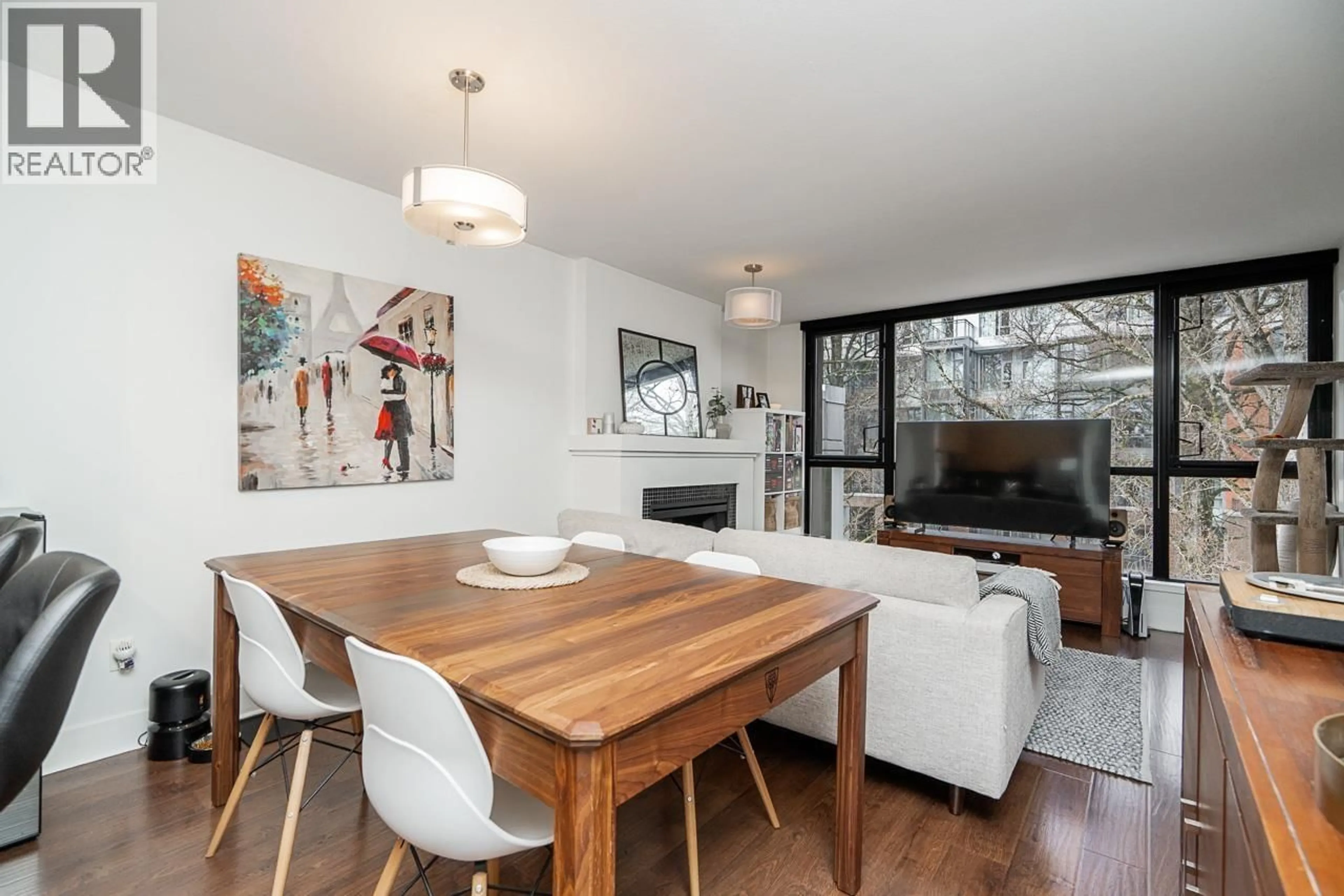 Dining room, wood/laminate floor for 502 - 2036 10TH AVENUE, Vancouver British Columbia V6J2B3