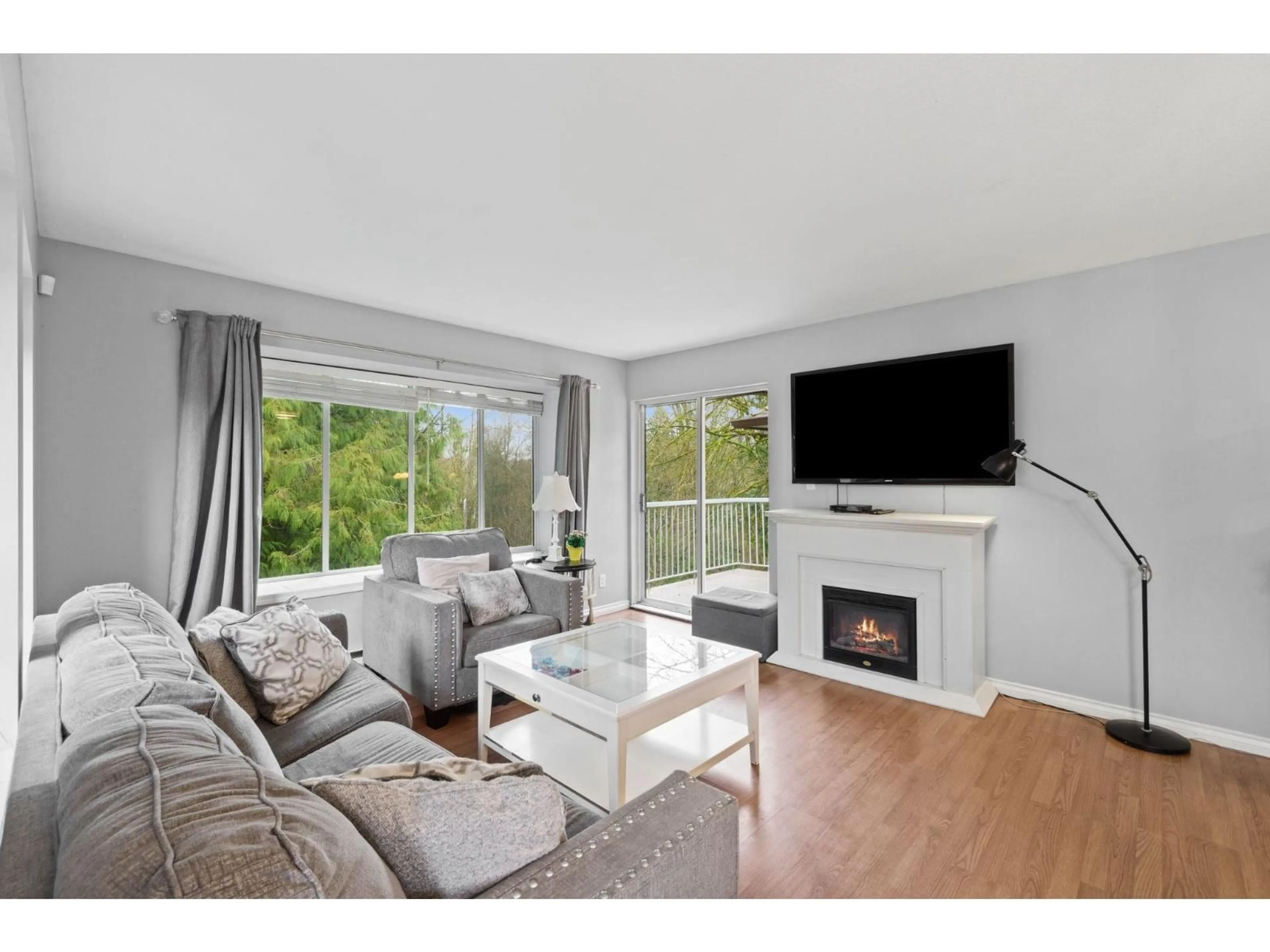 Living room with furniture, wood/laminate floor for 505 - 1750 MCKENZIE ROAD, Abbotsford British Columbia V2S3Z3