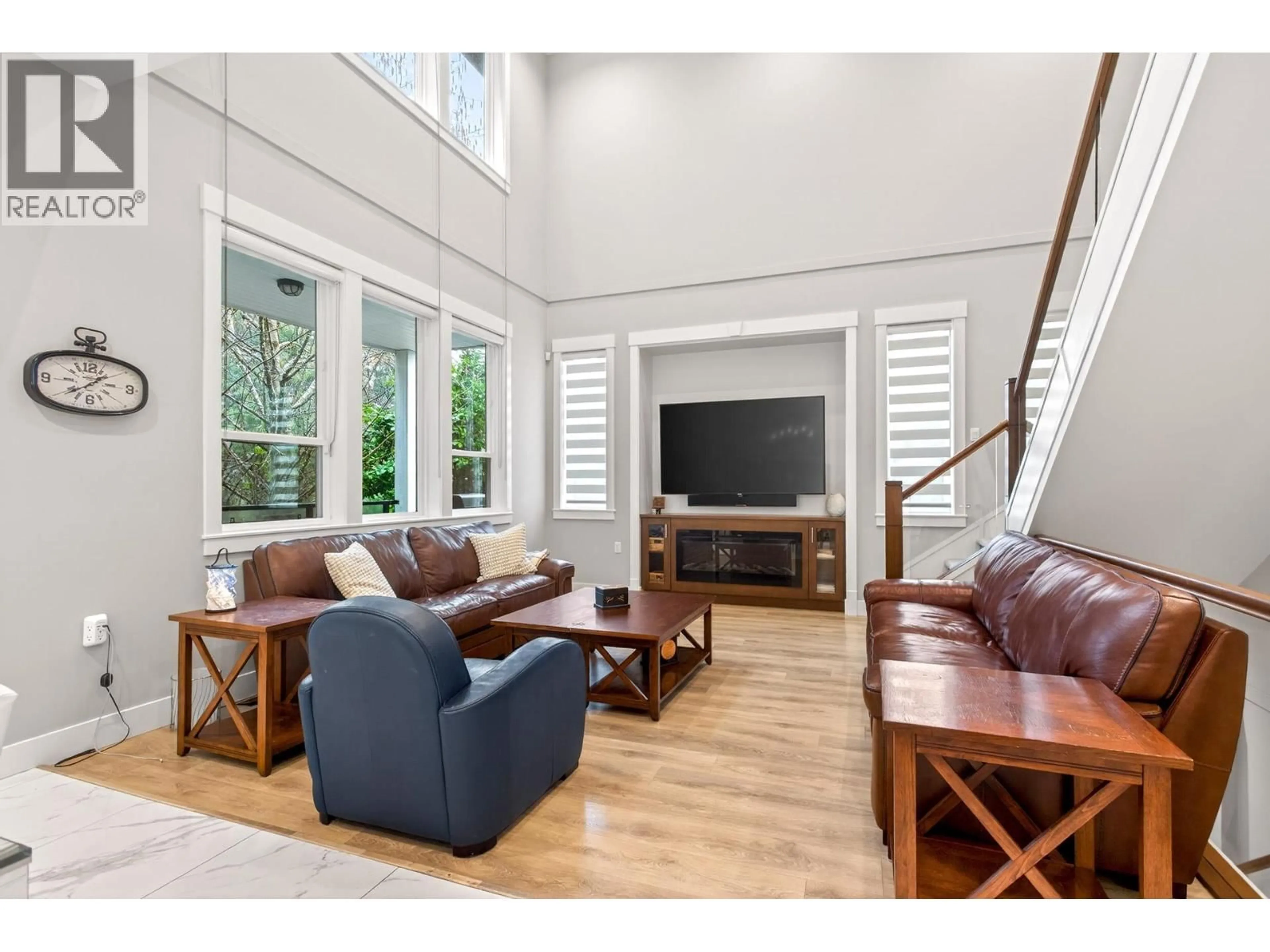 Living room with furniture, wood/laminate floor for 44 - 3295 SUNNYSIDE ROAD, Anmore British Columbia V3H4Z4