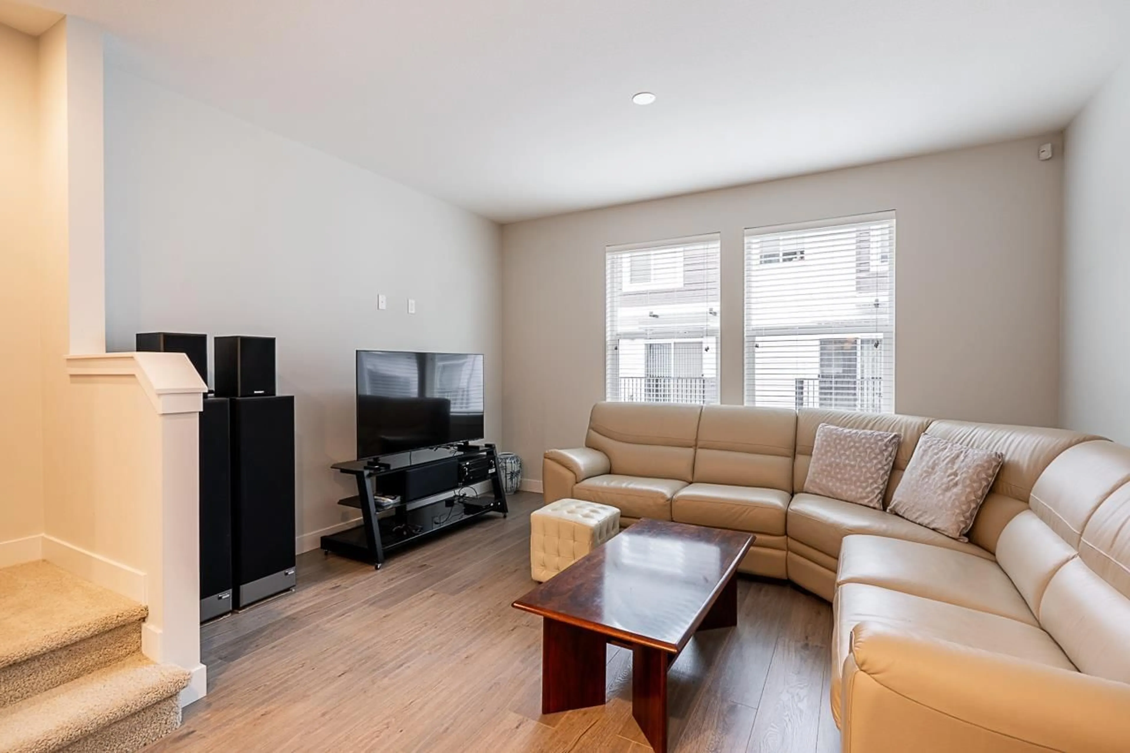 Living room with furniture, wood/laminate floor for 18 - 6089 144 STREET, Surrey British Columbia V3X1A4