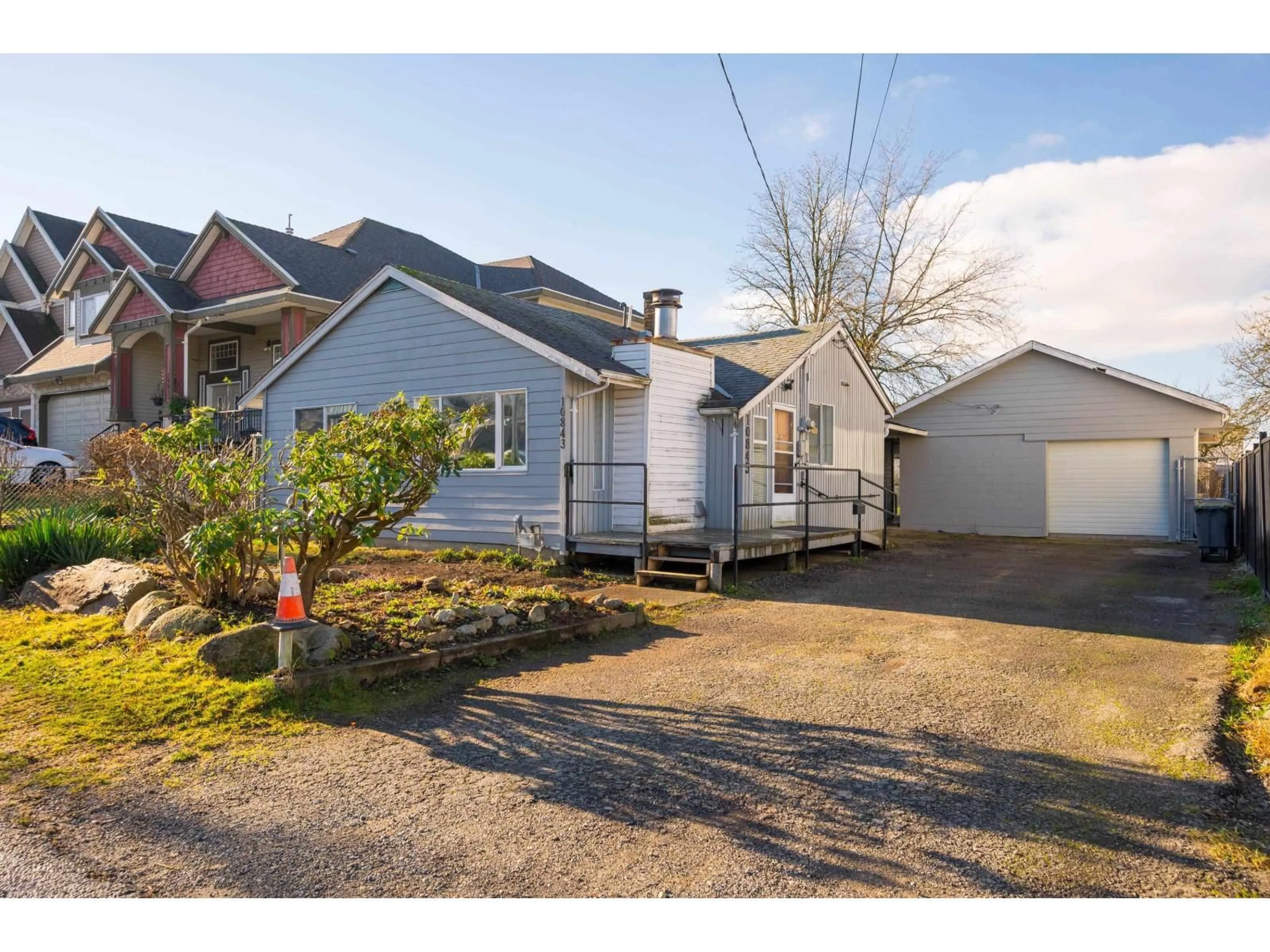 A pic from outside/outdoor area/front of a property/back of a property/a pic from drone, street for 10843 130 STREET, Surrey British Columbia V3T3L9