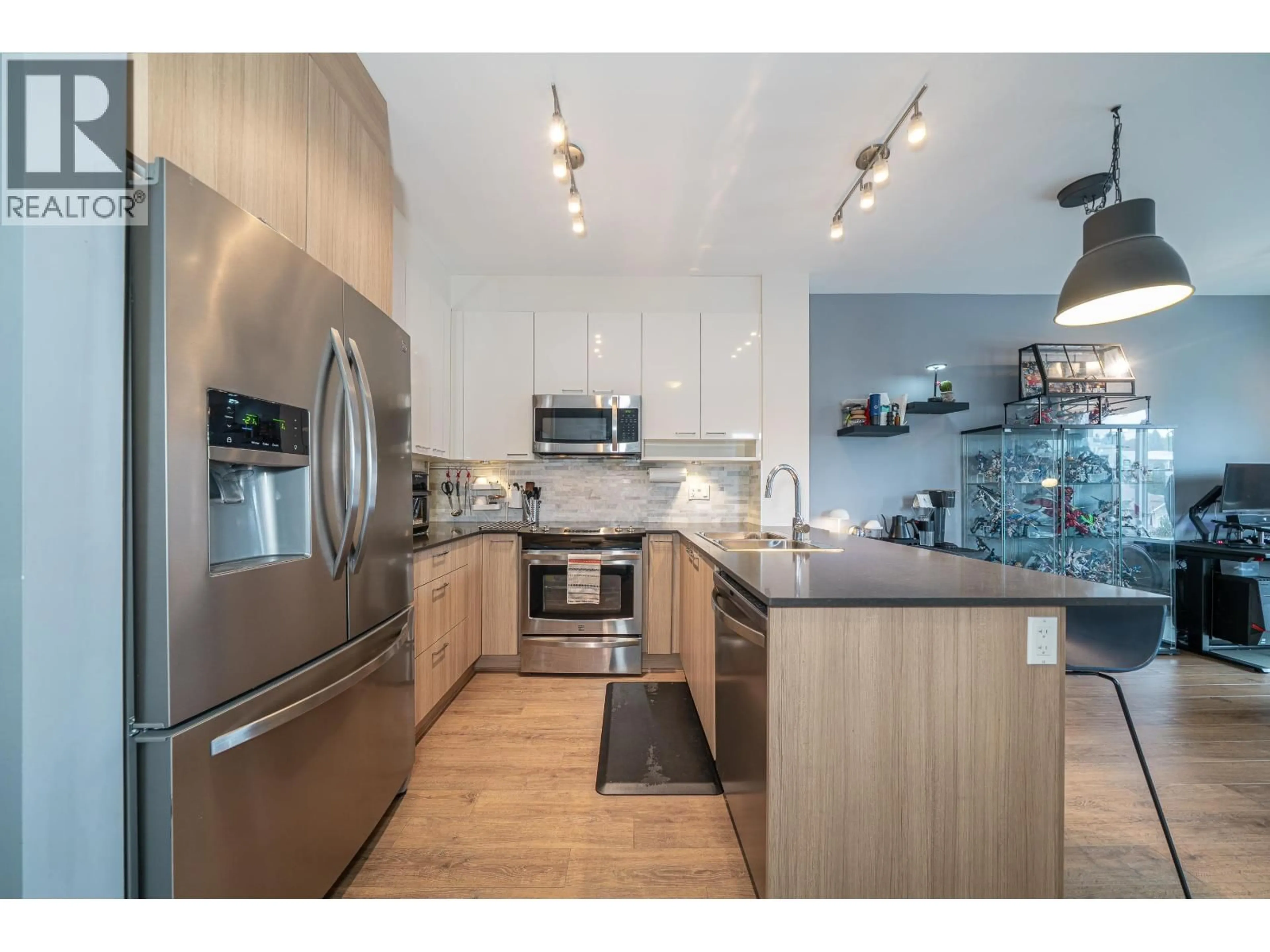 Open concept kitchen, wood/laminate floor for 409 - 210 LEBLEU STREET, Coquitlam British Columbia V3K4L6