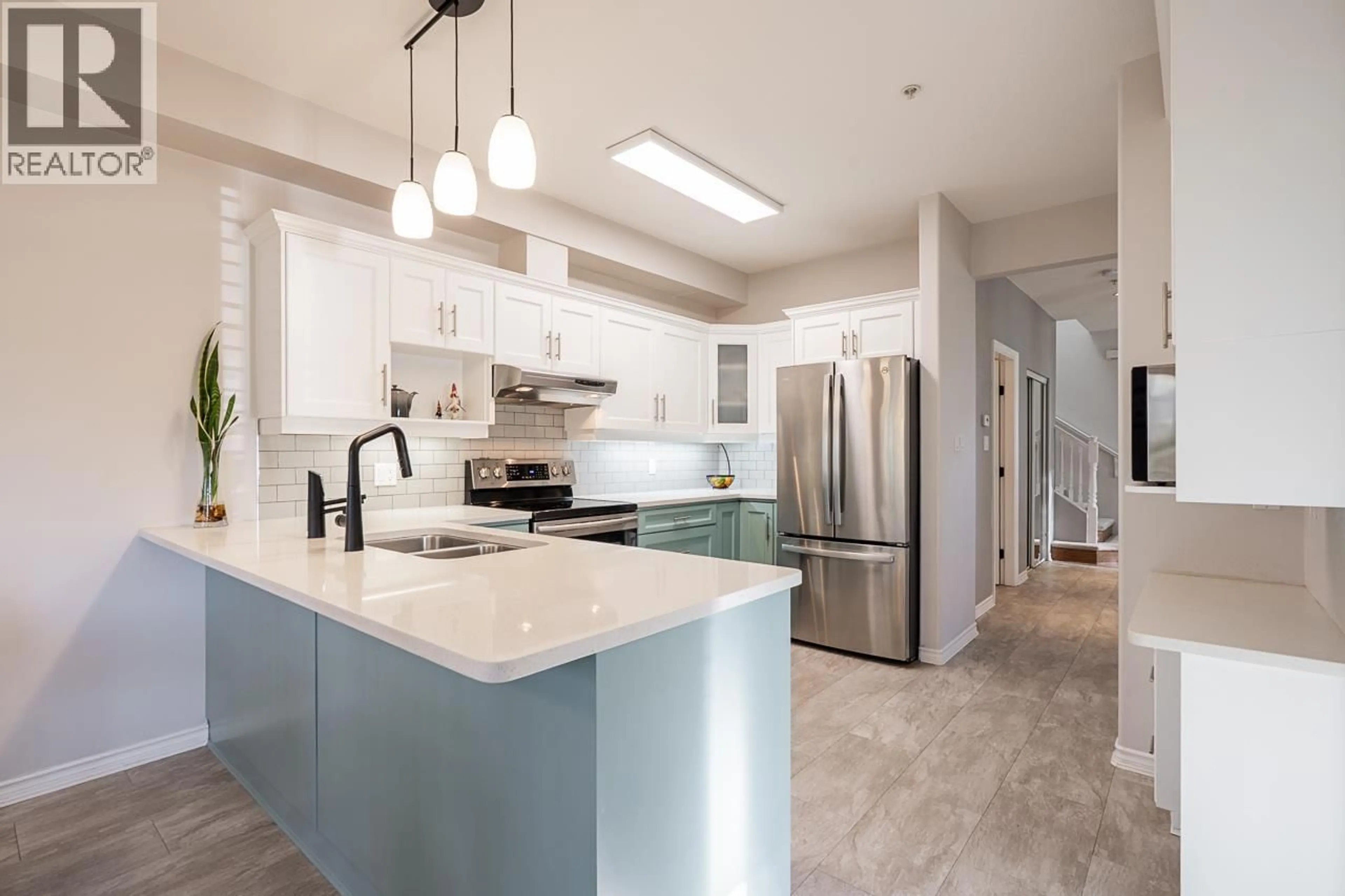 Open concept kitchen, ceramic/tile floor for 9 - 998 RIVERSIDE DRIVE, Port Coquitlam British Columbia V3B7Y4