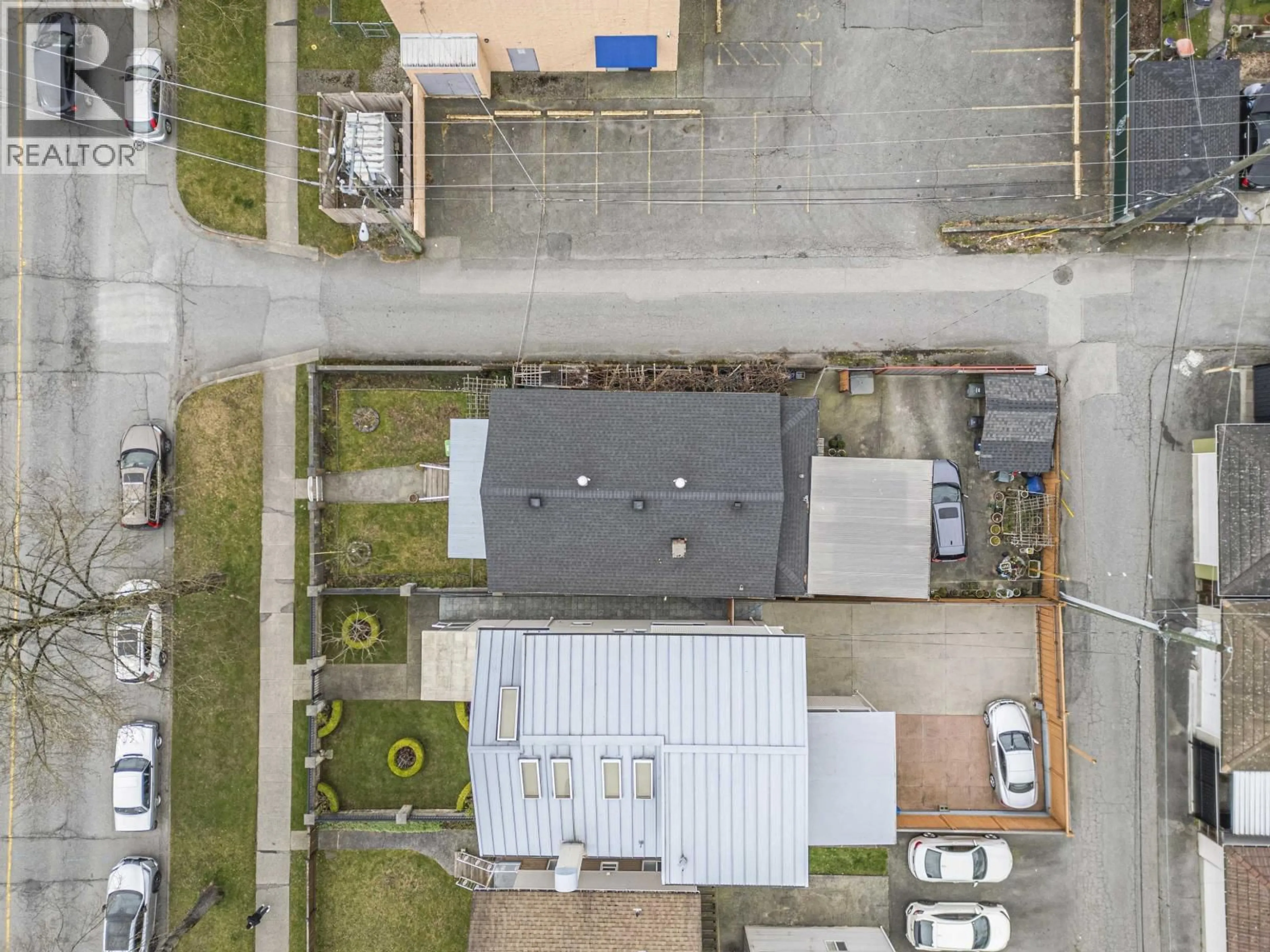 A pic from outside/outdoor area/front of a property/back of a property/a pic from drone, street for 3309 29TH AVENUE, Vancouver British Columbia V5R1W7