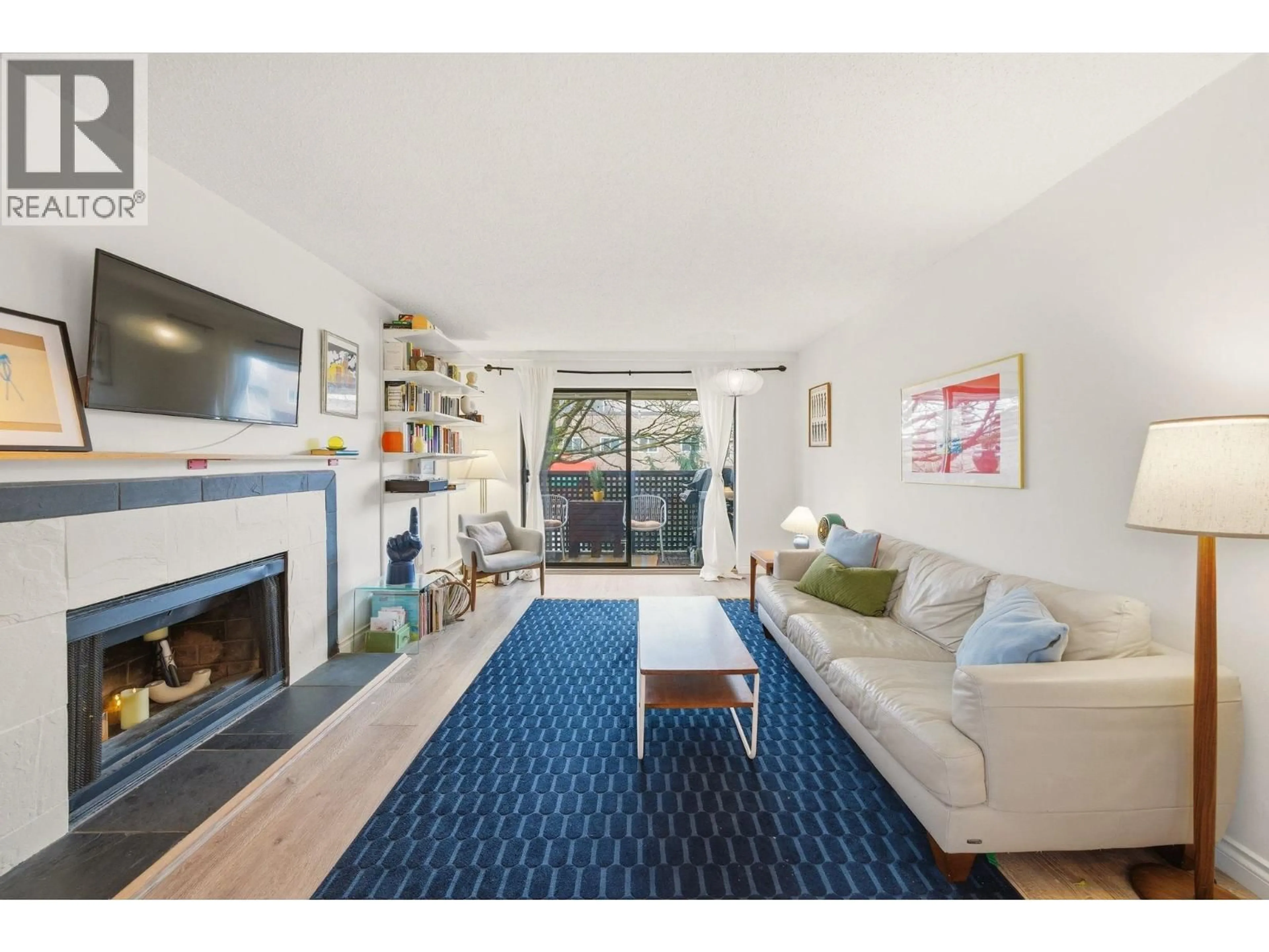 Living room with furniture, unknown for 207 - 2215 DUNDAS STREET, Vancouver British Columbia V5L1J9