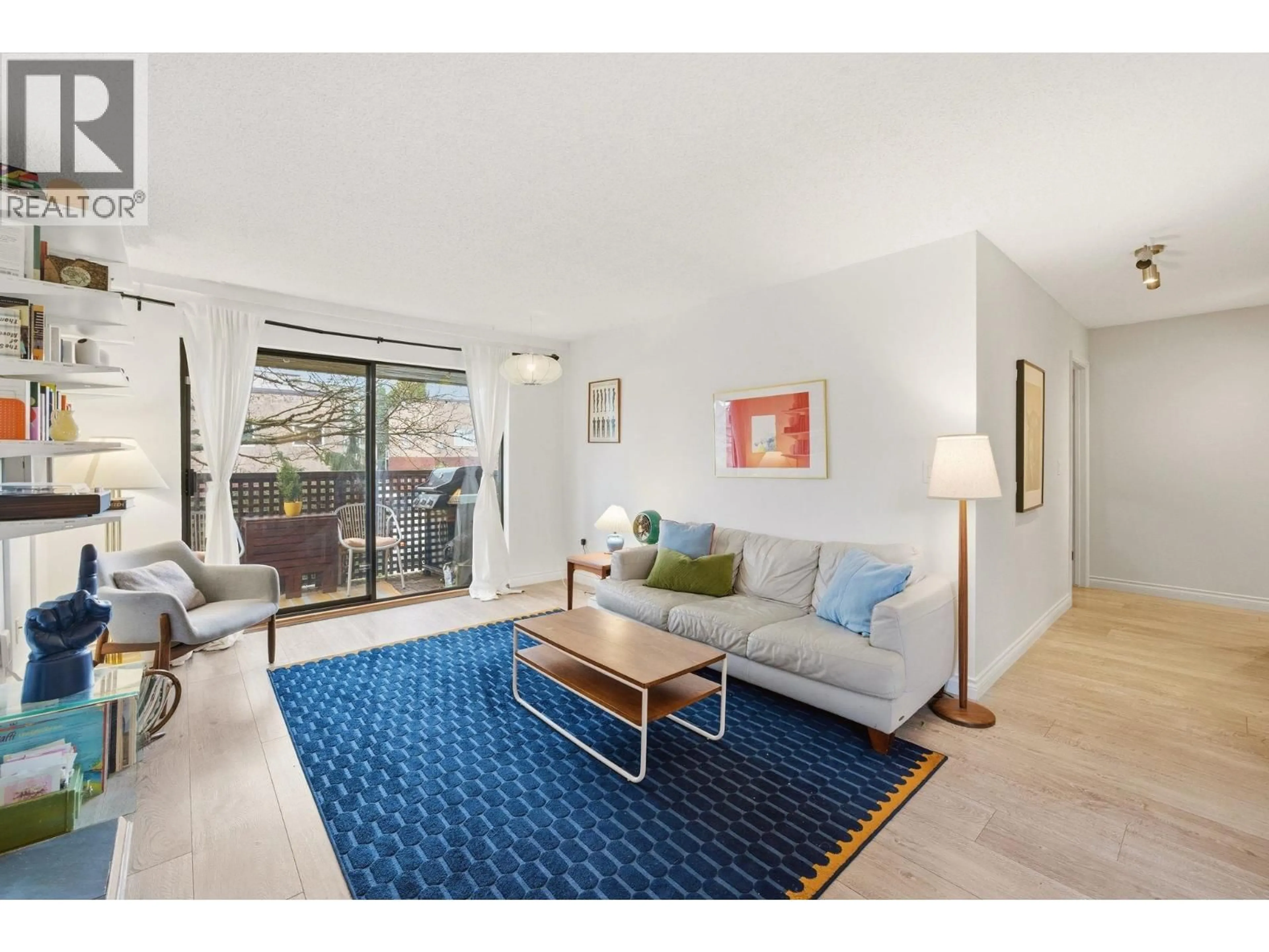 Living room with furniture, unknown for 207 - 2215 DUNDAS STREET, Vancouver British Columbia V5L1J9