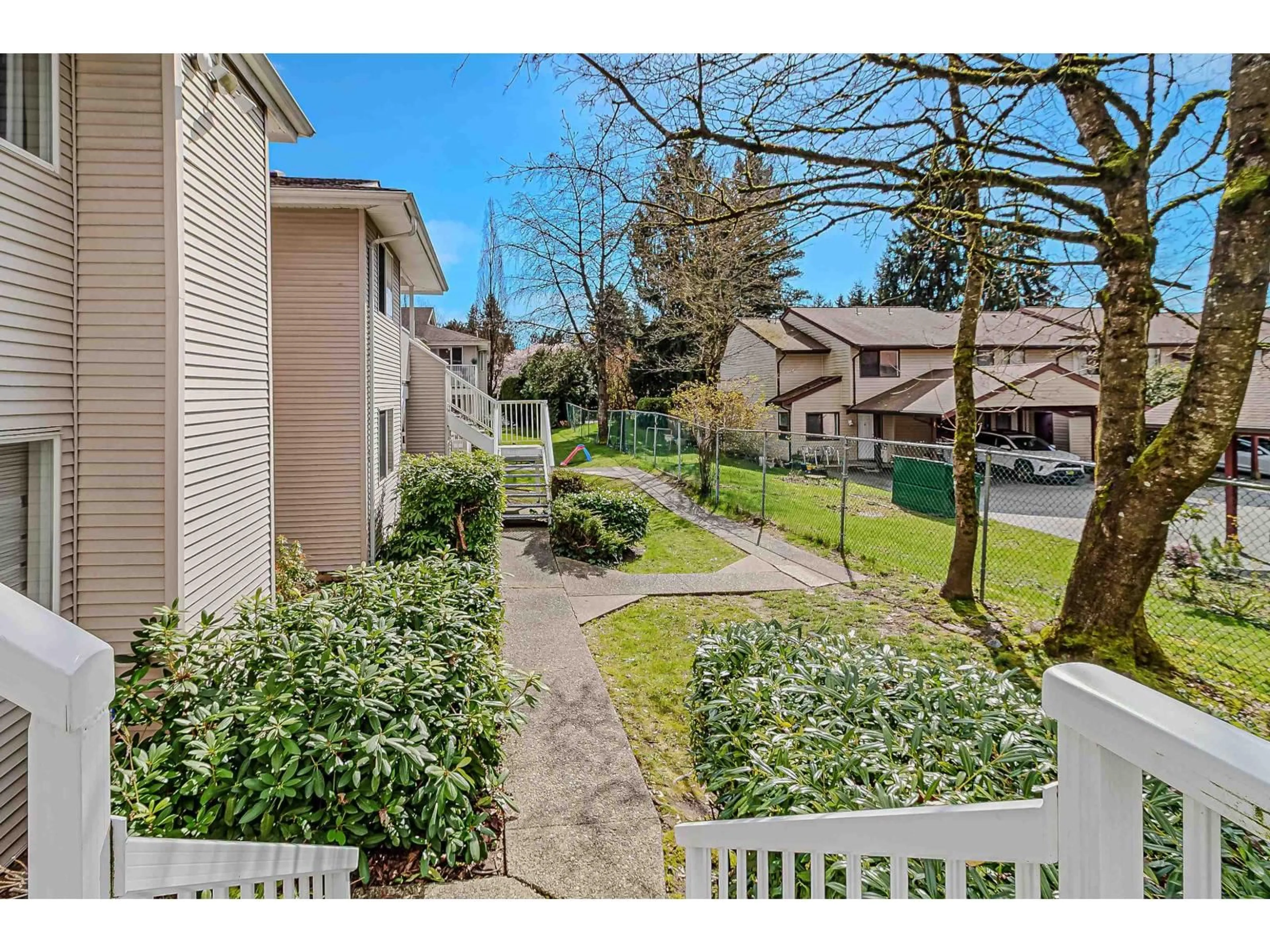 A pic from outside/outdoor area/front of a property/back of a property/a pic from drone, street for 613 - 13923 72 AVENUE, Surrey British Columbia V3W2P6
