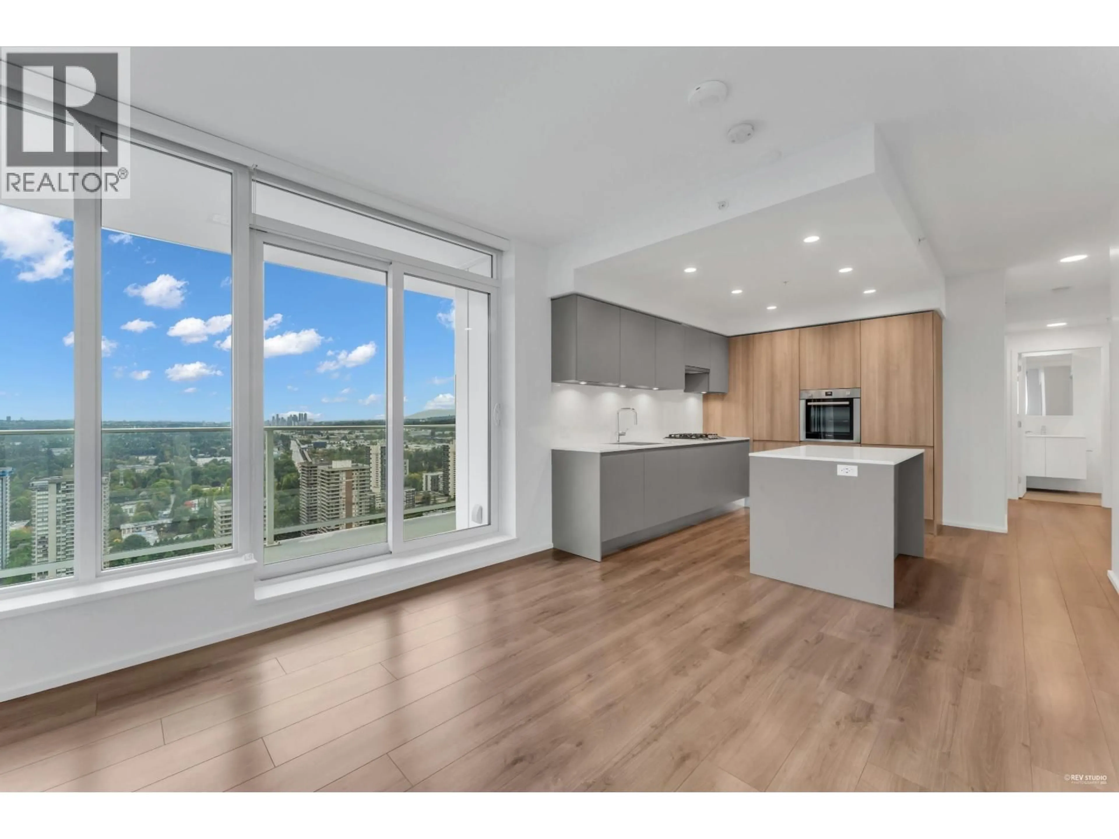 Open concept kitchen, wood/laminate floor for 3407 - 3833 EVERGREEN PLACE, Burnaby British Columbia V3J0M2