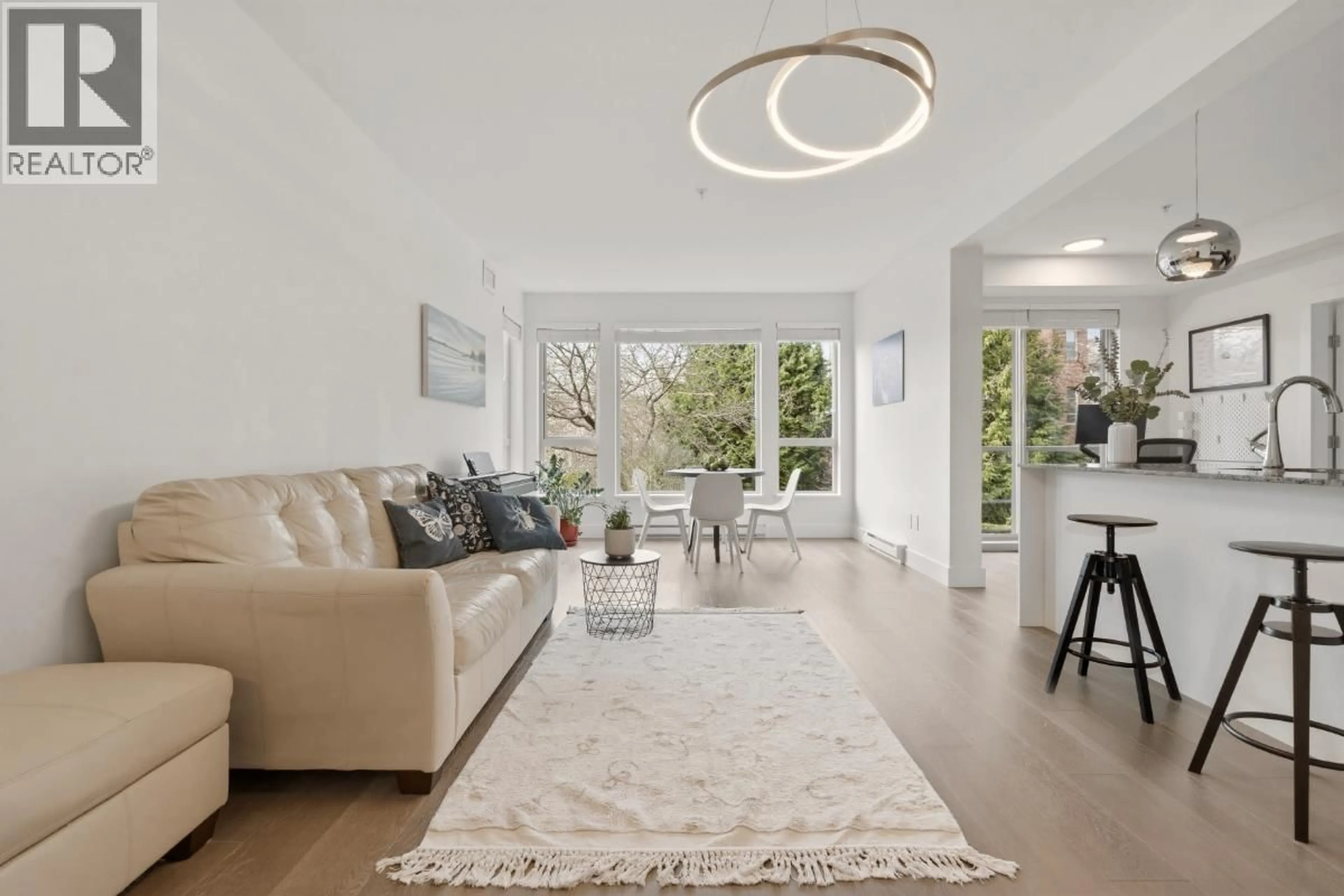 Living room with furniture, unknown for 210 - 6268 EAGLES DRIVE, Vancouver British Columbia V6T0A2