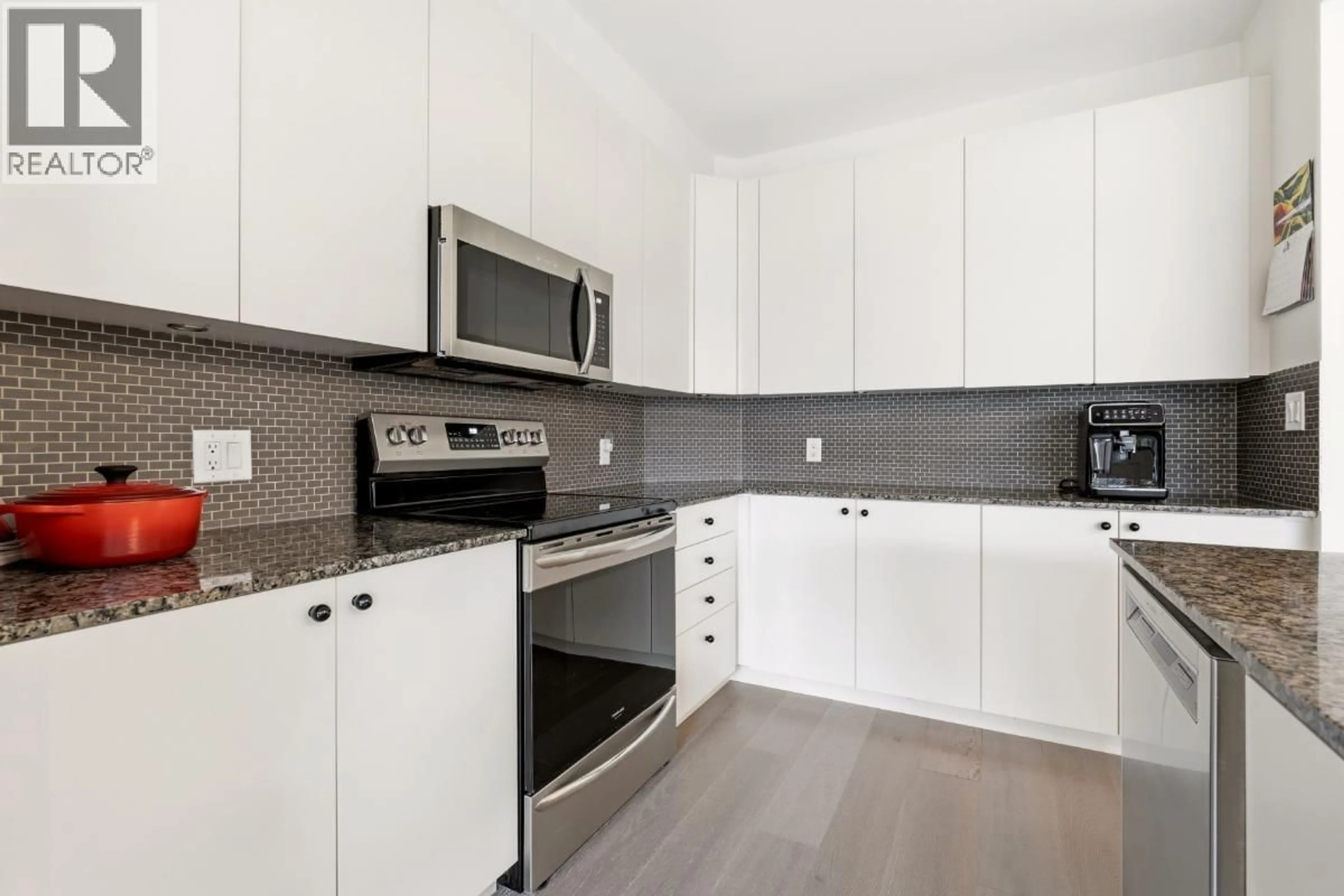 Standard kitchen, ceramic/tile floor for 210 - 6268 EAGLES DRIVE, Vancouver British Columbia V6T0A2