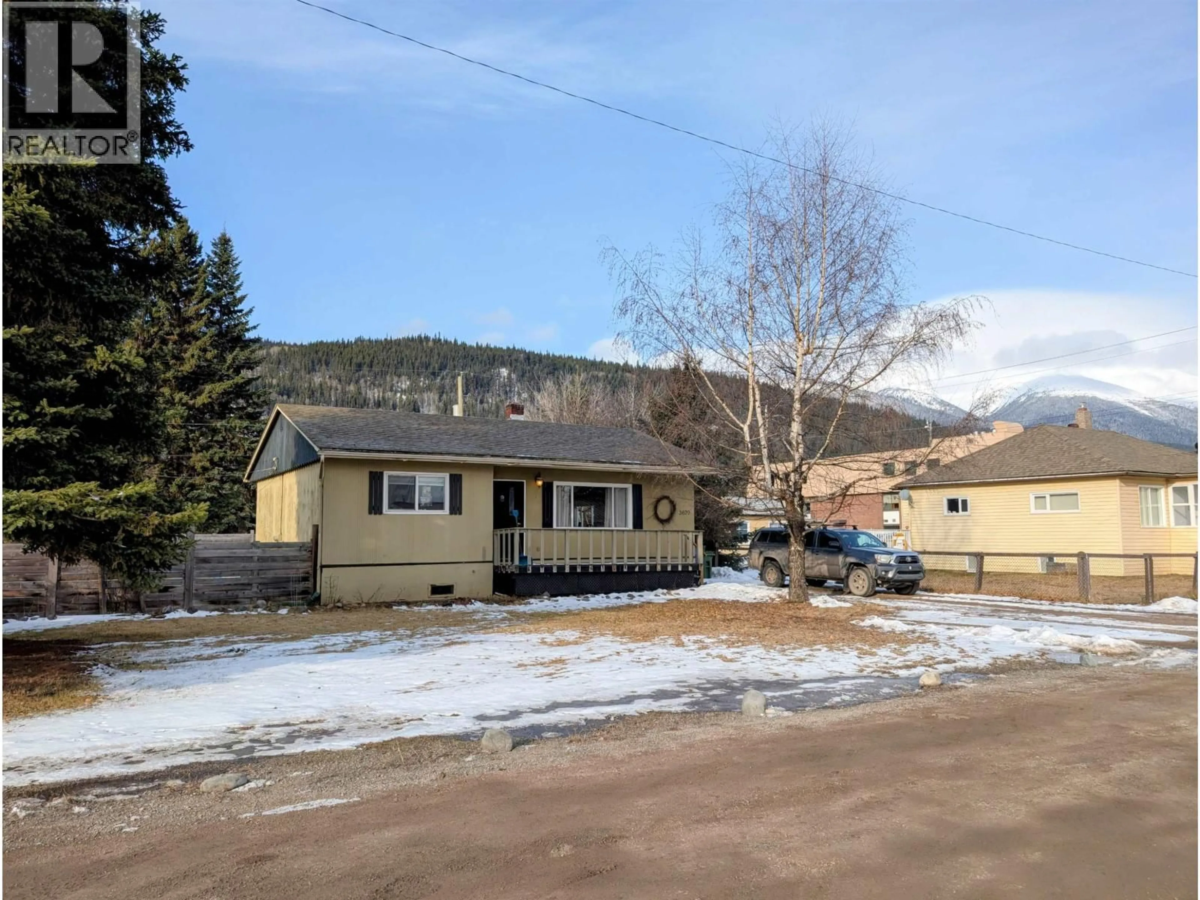 A pic from outside/outdoor area/front of a property/back of a property/a pic from drone, mountain view for 3679 BROADWAY AVENUE, Smithers British Columbia V0J2N0