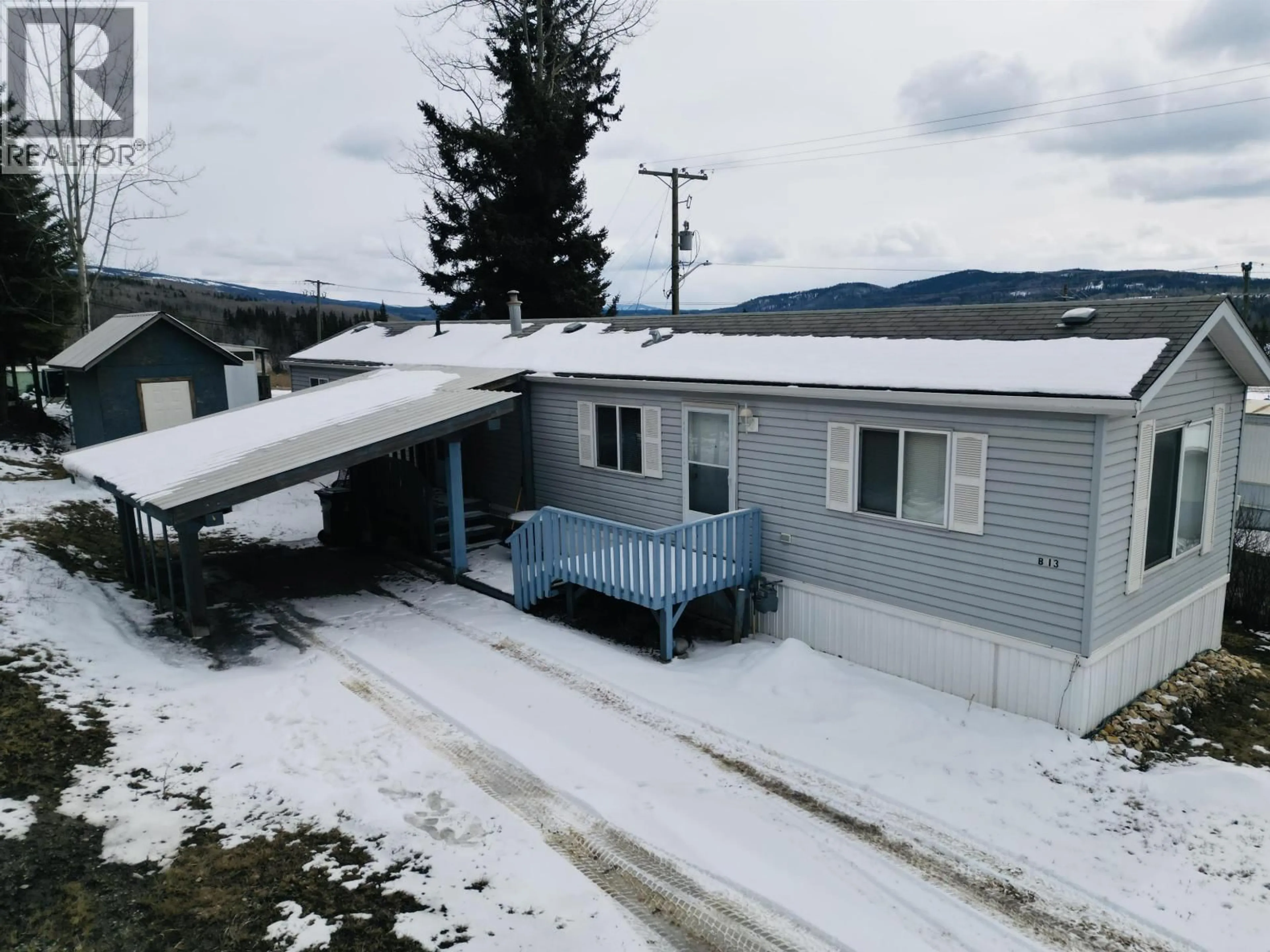 A pic from outside/outdoor area/front of a property/back of a property/a pic from drone, mountain view for B13 - 160 16 HIGHWAY, Burns Lake British Columbia V0J1E0